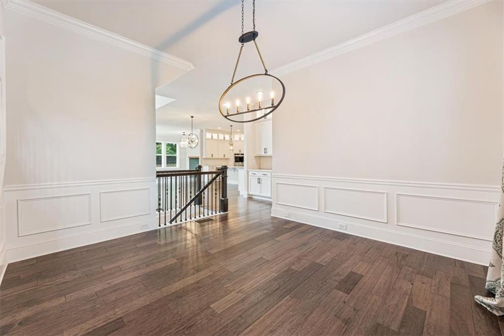 947 Hunter Way Milton, GA 30004 - Photo 20 of 78 a view of a room with wooden floor and white walls