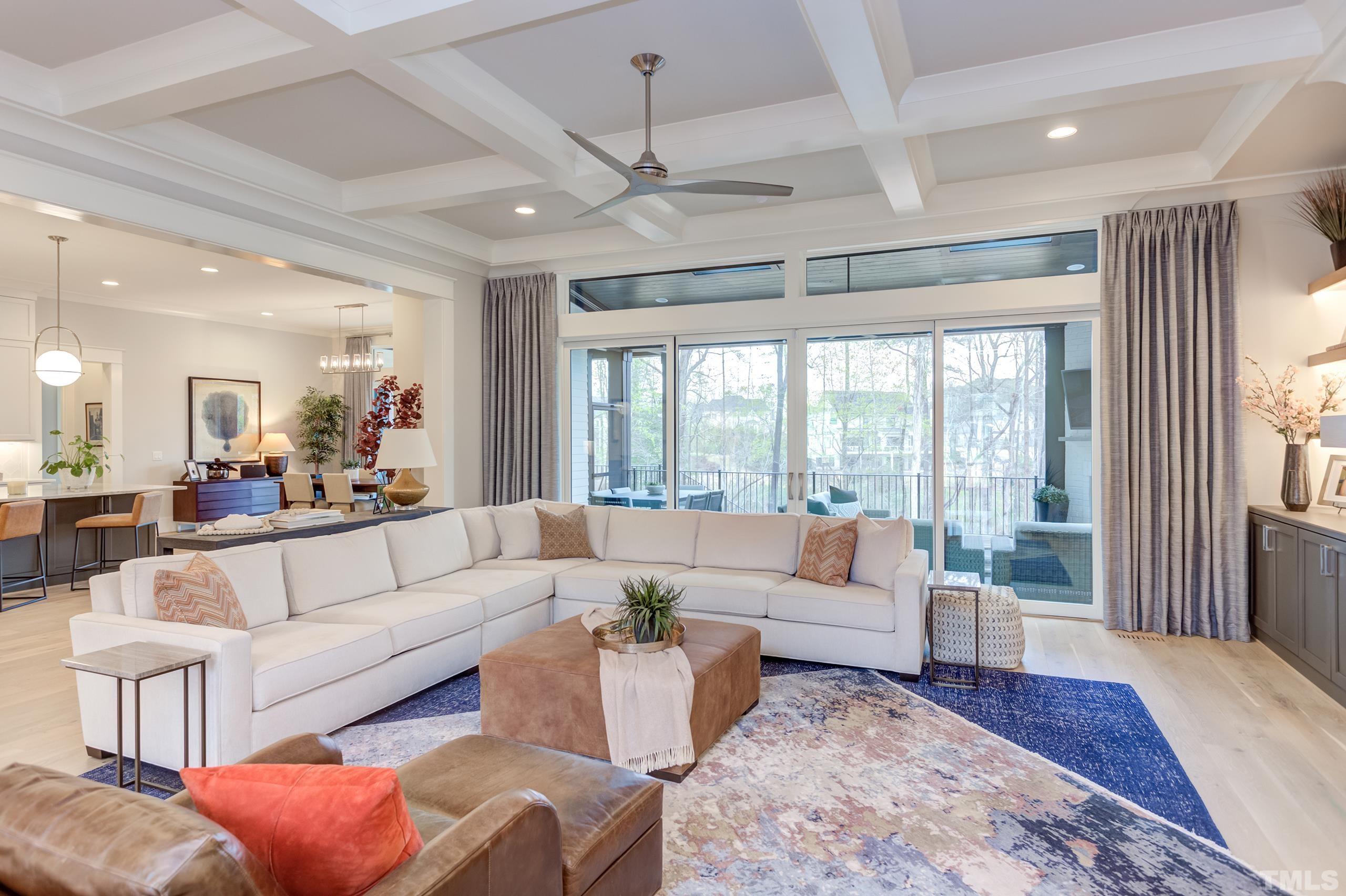 5112 Winding View Lane Raleigh, NC 27615 - Photo 17 of 71 a living room with furniture and a large window
