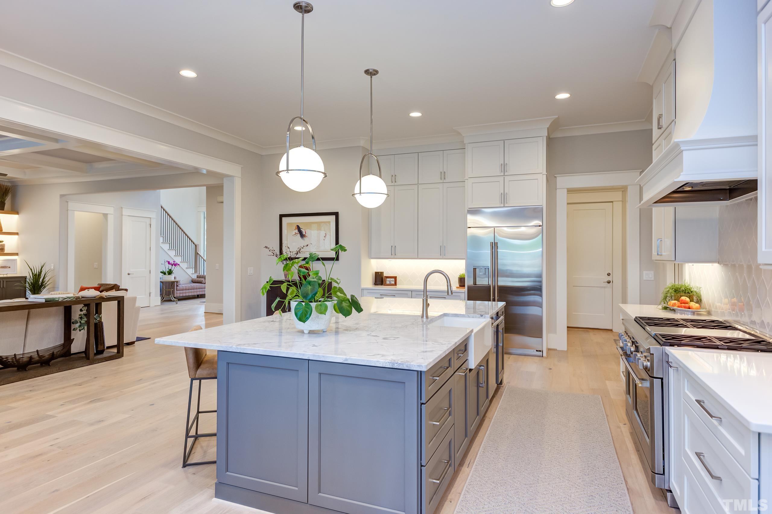 5112 Winding View Lane Raleigh, NC 27615 - Photo 27 of 71 a kitchen with counter space and wooden floor