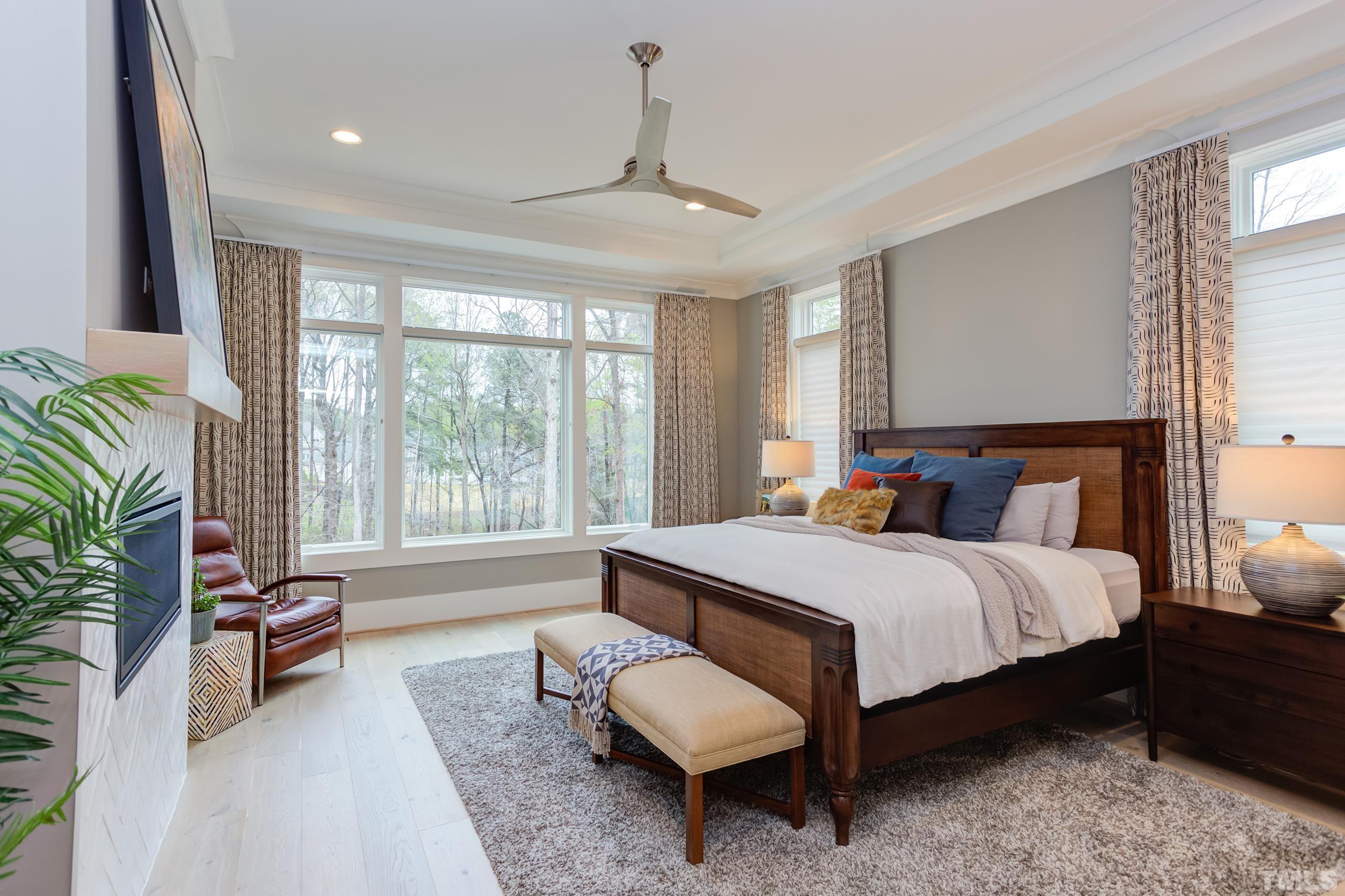 5112 Winding View Lane Raleigh, NC 27615 - Photo 31 of 71 a bed room with a bed and a couch