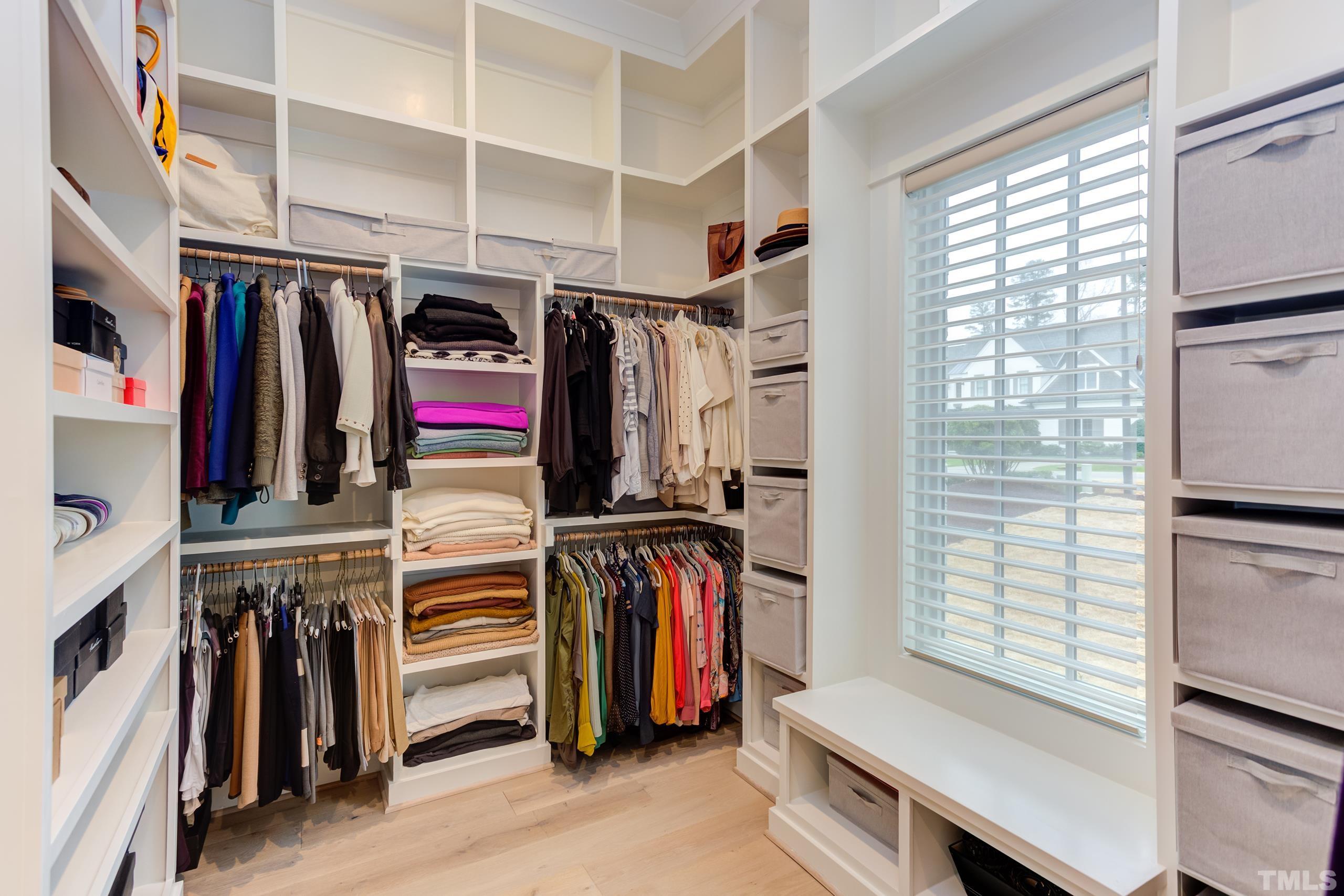 5112 Winding View Lane Raleigh, NC 27615 - Photo 38 of 71 a view of walk in closet with clothes and shoes