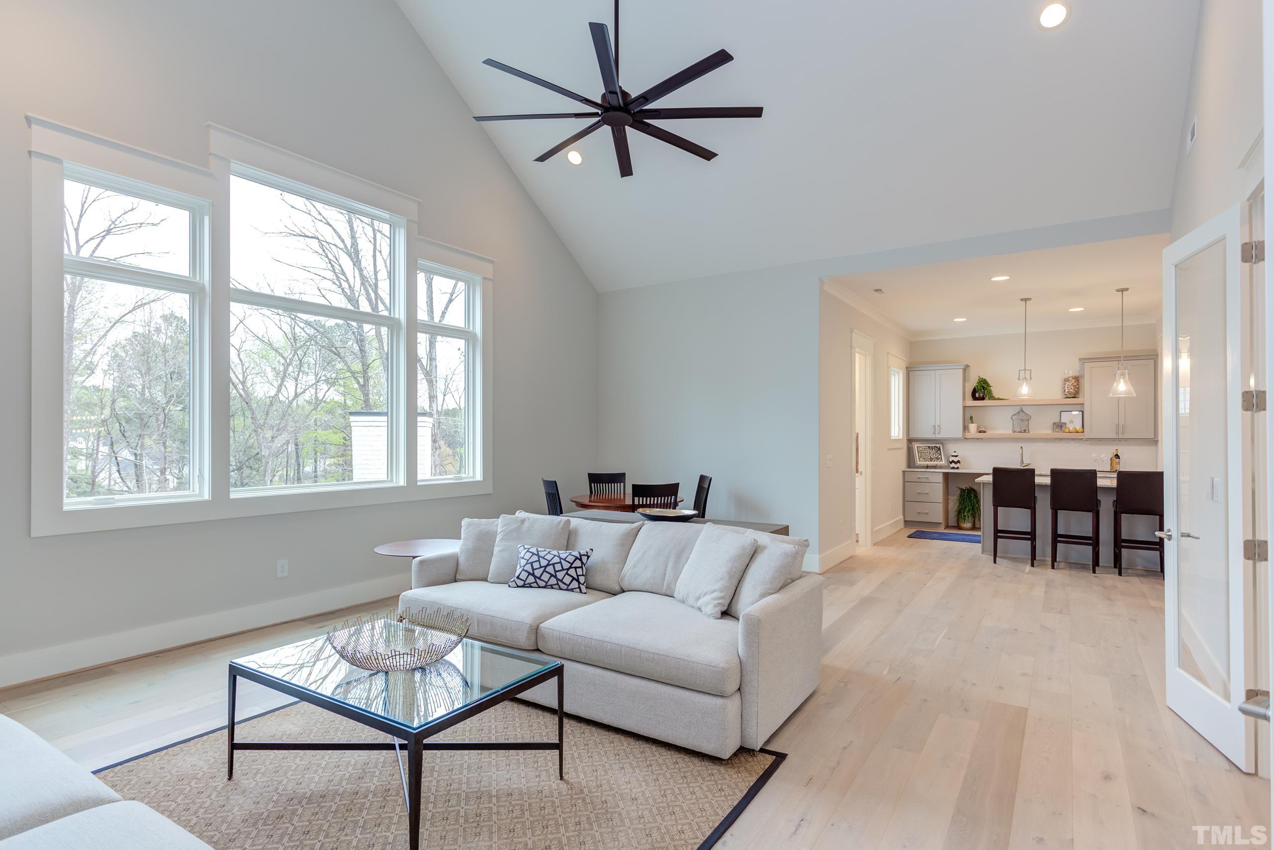 5112 Winding View Lane Raleigh, NC 27615 - Photo 44 of 71 a living room with furniture and a large window