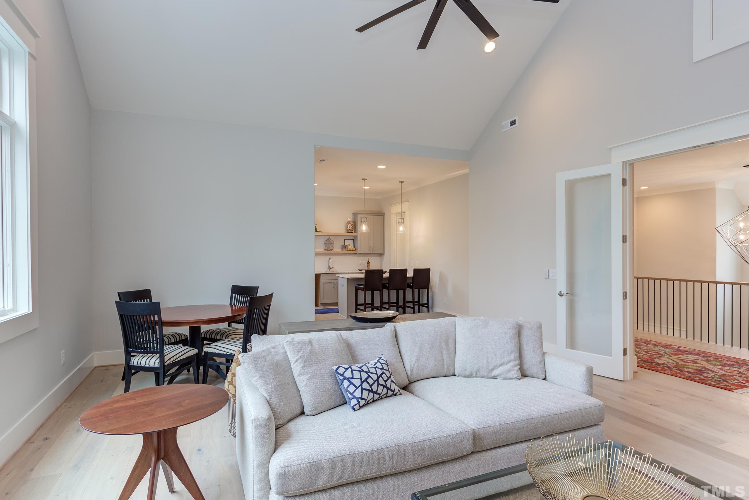 5112 Winding View Lane Raleigh, NC 27615 - Photo 46 of 71 a living room with furniture and a wooden floor