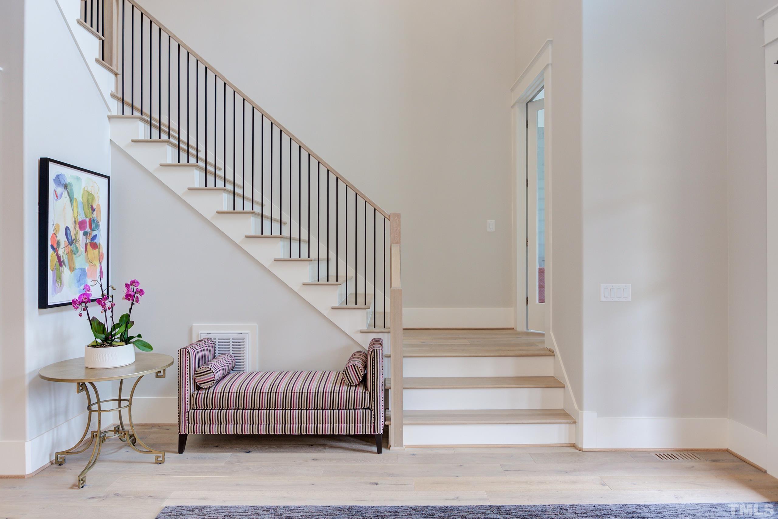 5112 Winding View Lane Raleigh, NC 27615 - Photo 5 of 71 a view of entryway with wooden floor and stairs