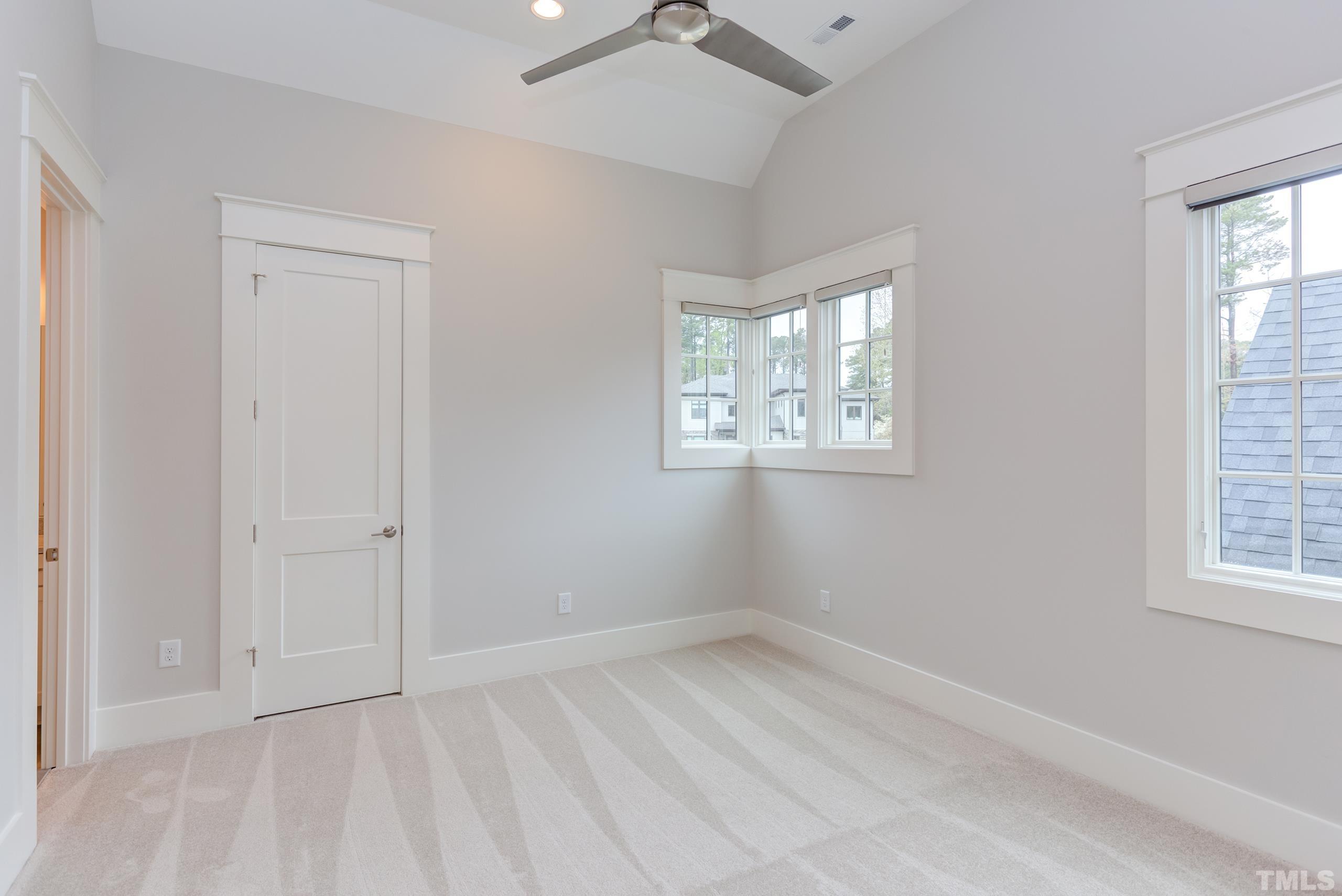 5112 Winding View Lane Raleigh, NC 27615 - Photo 52 of 71 an empty room with windows