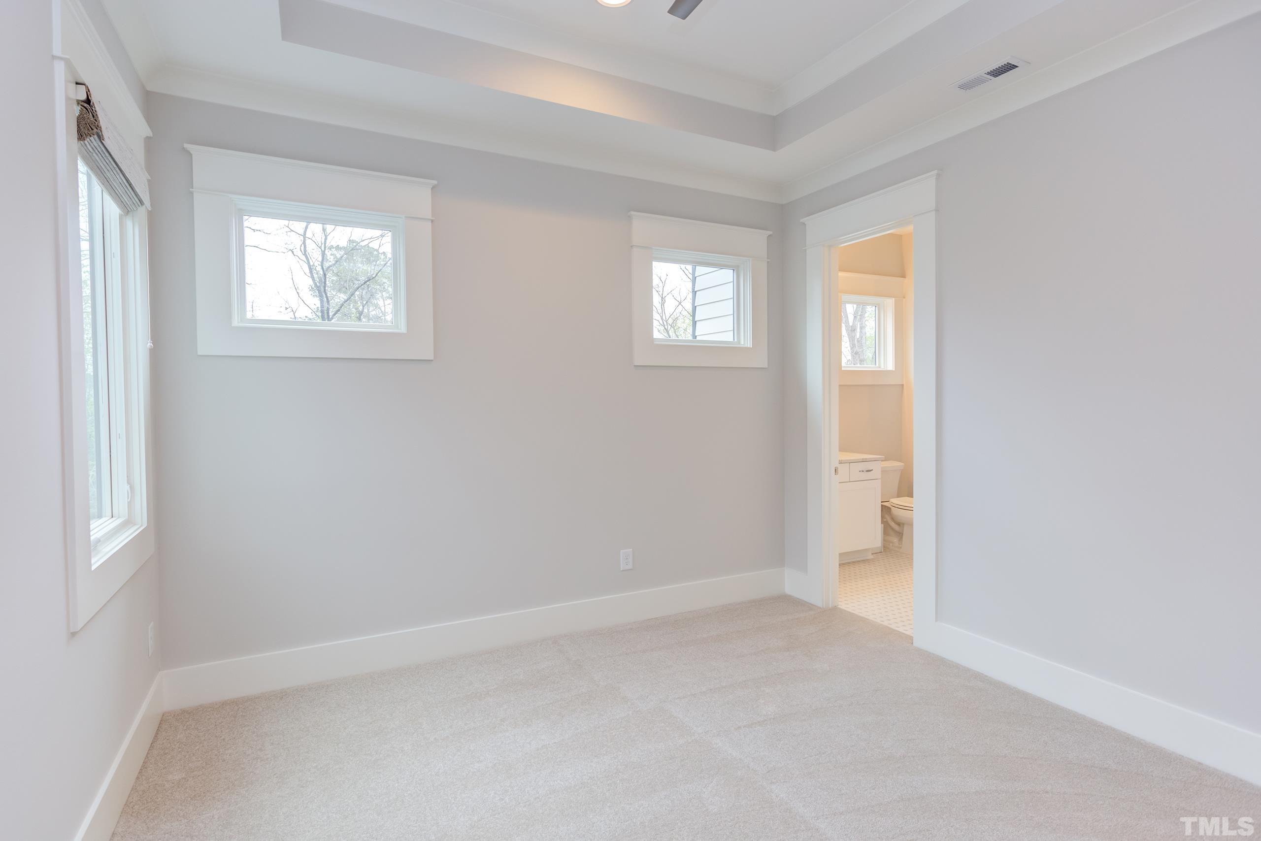 5112 Winding View Lane Raleigh, NC 27615 - Photo 55 of 71 an empty room with windows and closet