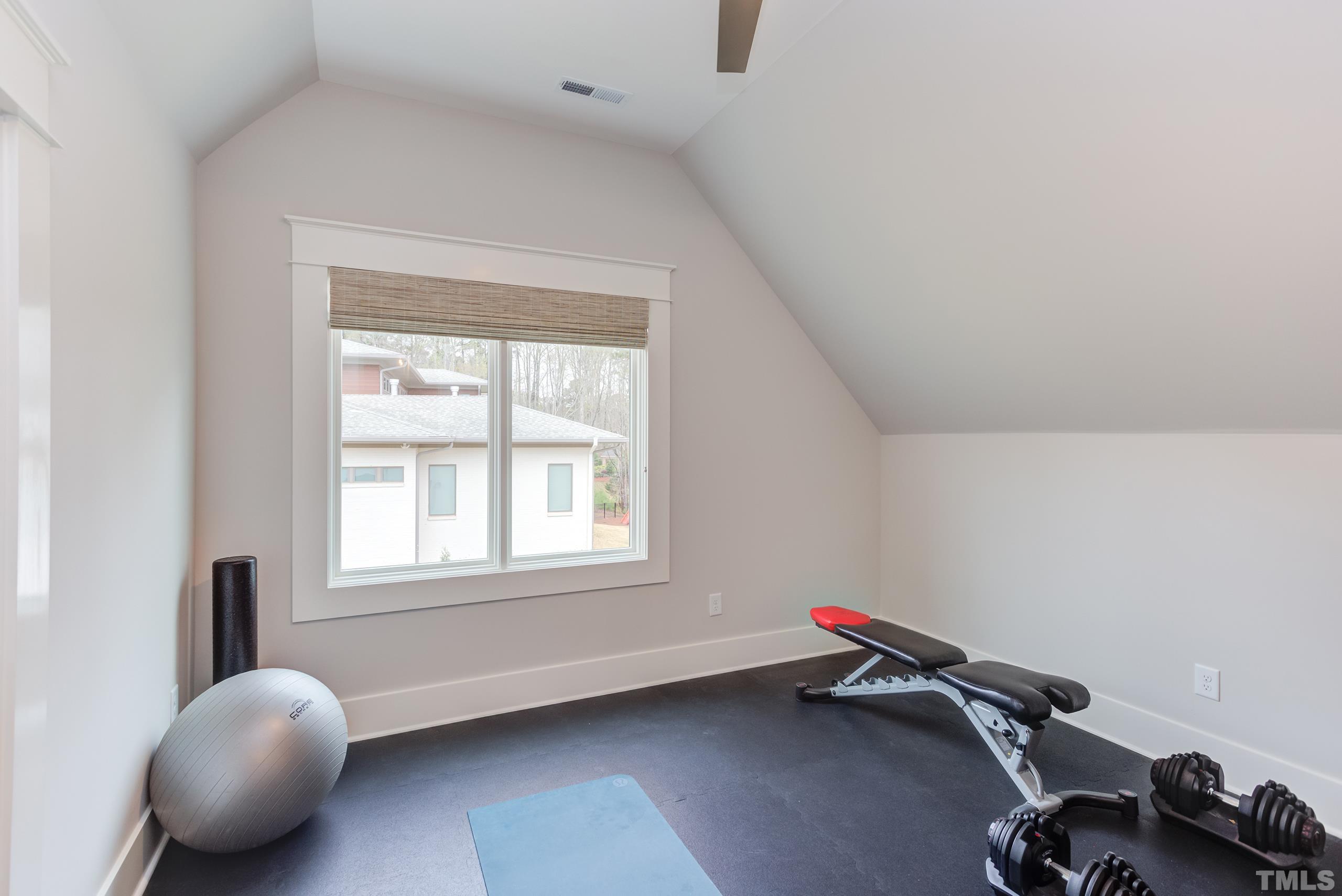 5112 Winding View Lane Raleigh, NC 27615 - Photo 57 of 71 a room with furniture and a window