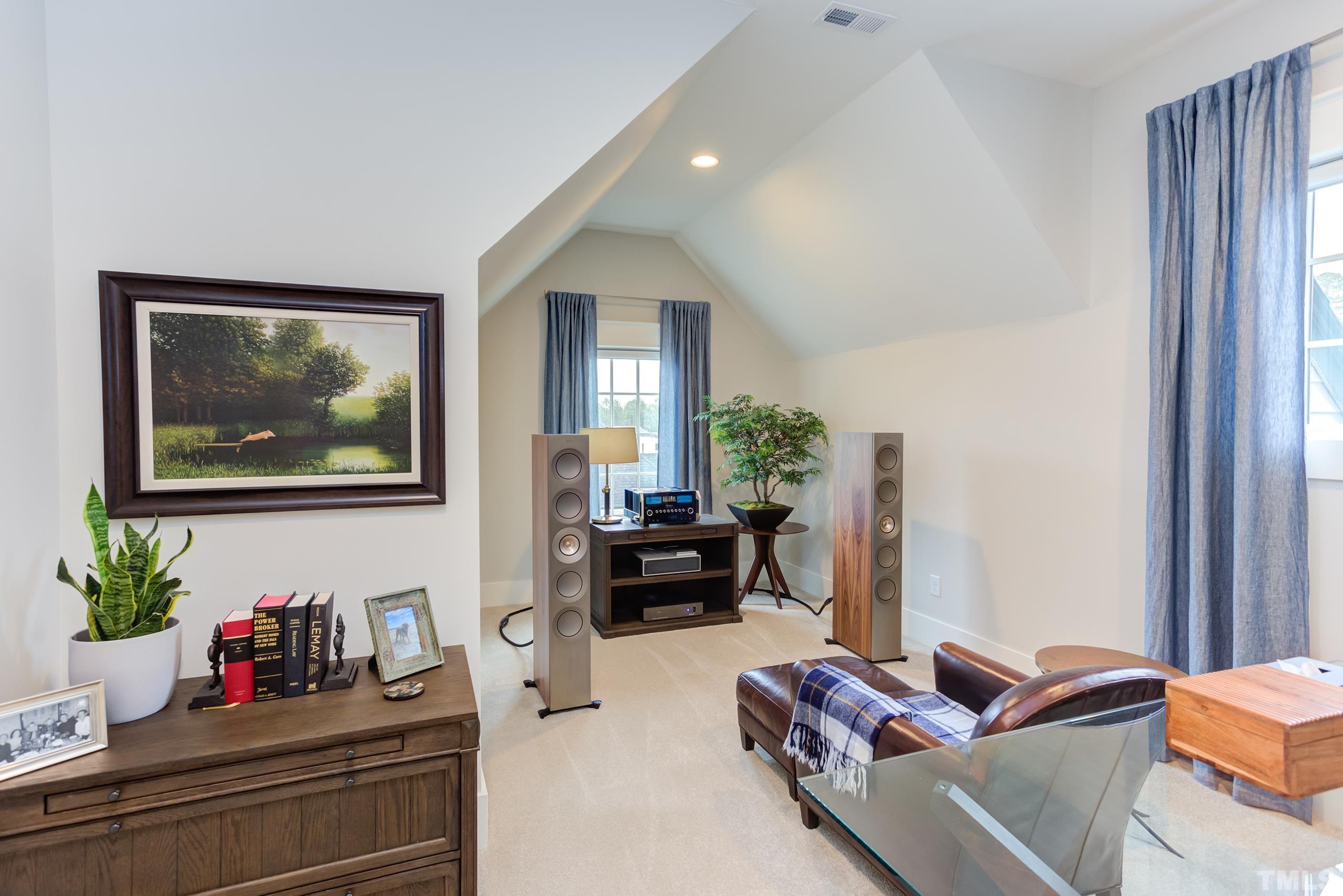 5112 Winding View Lane Raleigh, NC 27615 - Photo 58 of 71 a living room with furniture and a large window