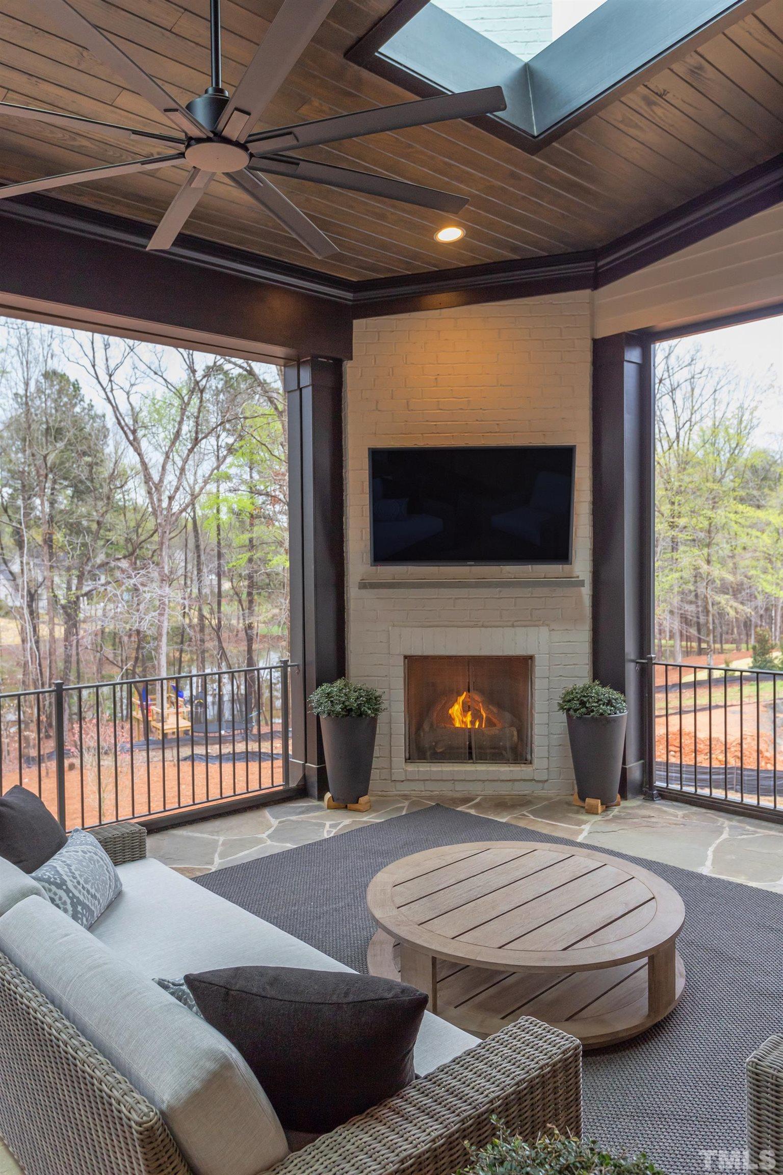 5112 Winding View Lane Raleigh, NC 27615 - Photo 61 of 71 a bedroom with furniture and a fireplace