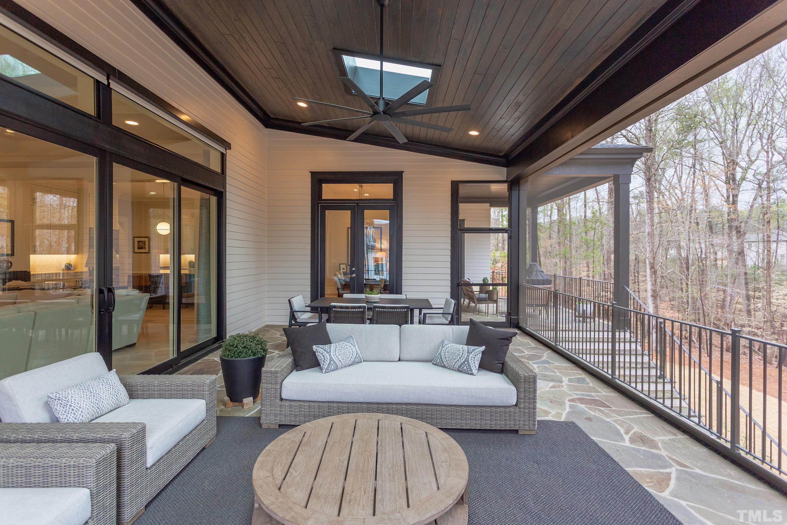 5112 Winding View Lane Raleigh, NC 27615 - Photo 62 of 71 a living room with furniture and a large window