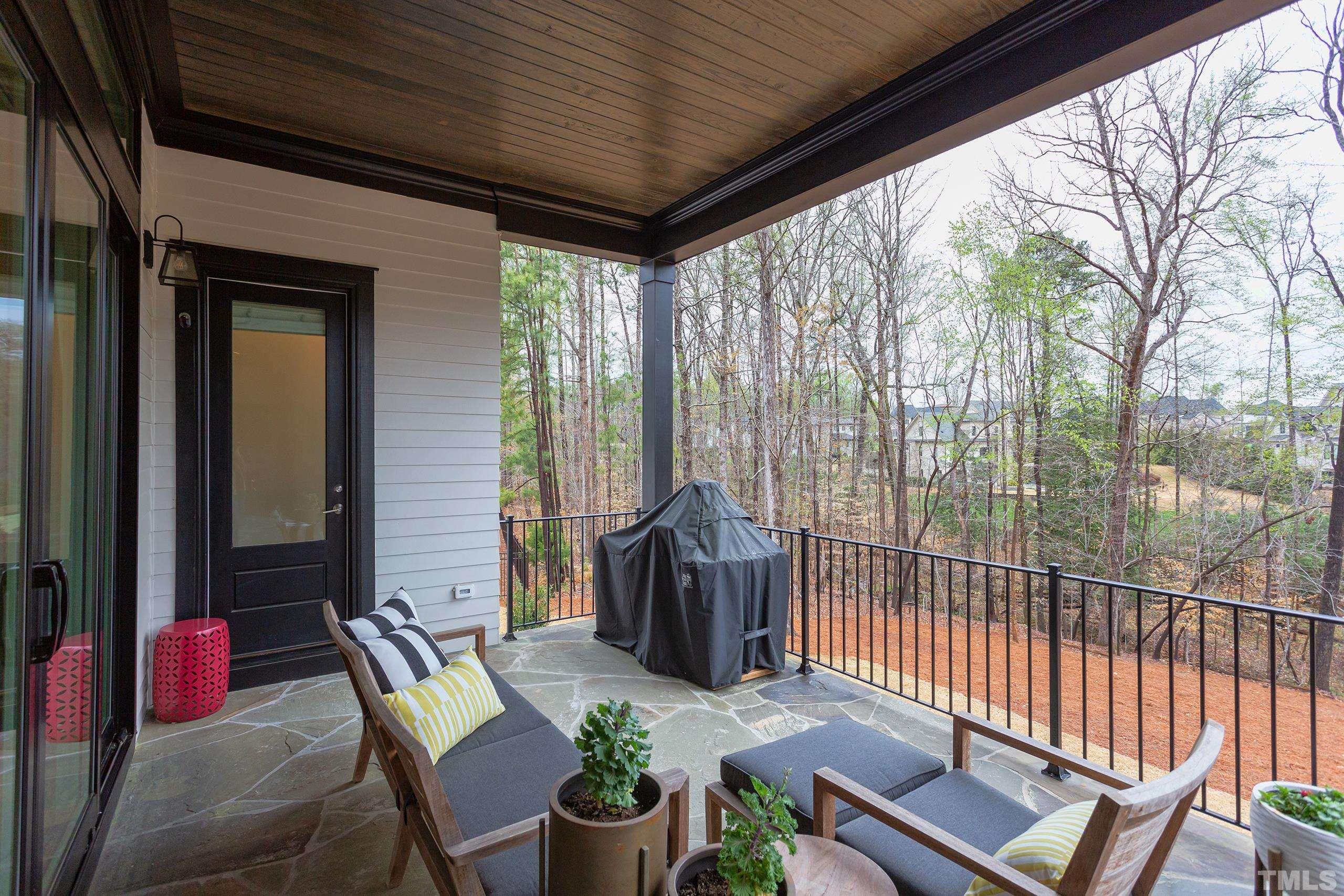 5112 Winding View Lane Raleigh, NC 27615 - Photo 68 of 71 a view of a porch with furniture