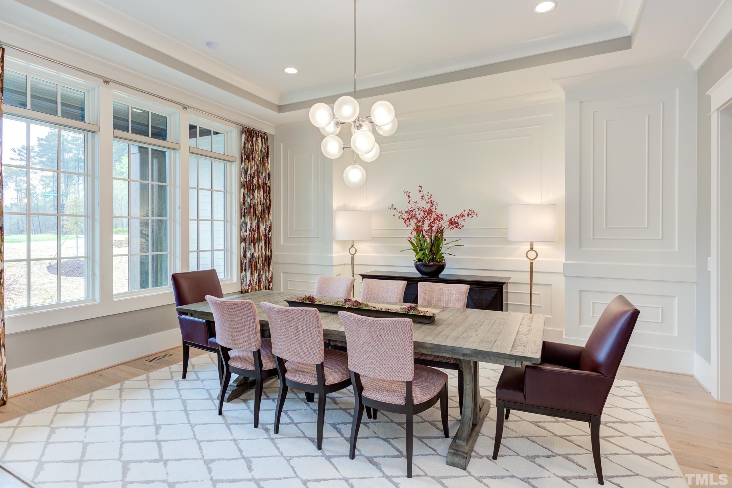 5112 Winding View Lane Raleigh, NC 27615 - Photo 9 of 71 a view of a dining room with furniture and chandelier