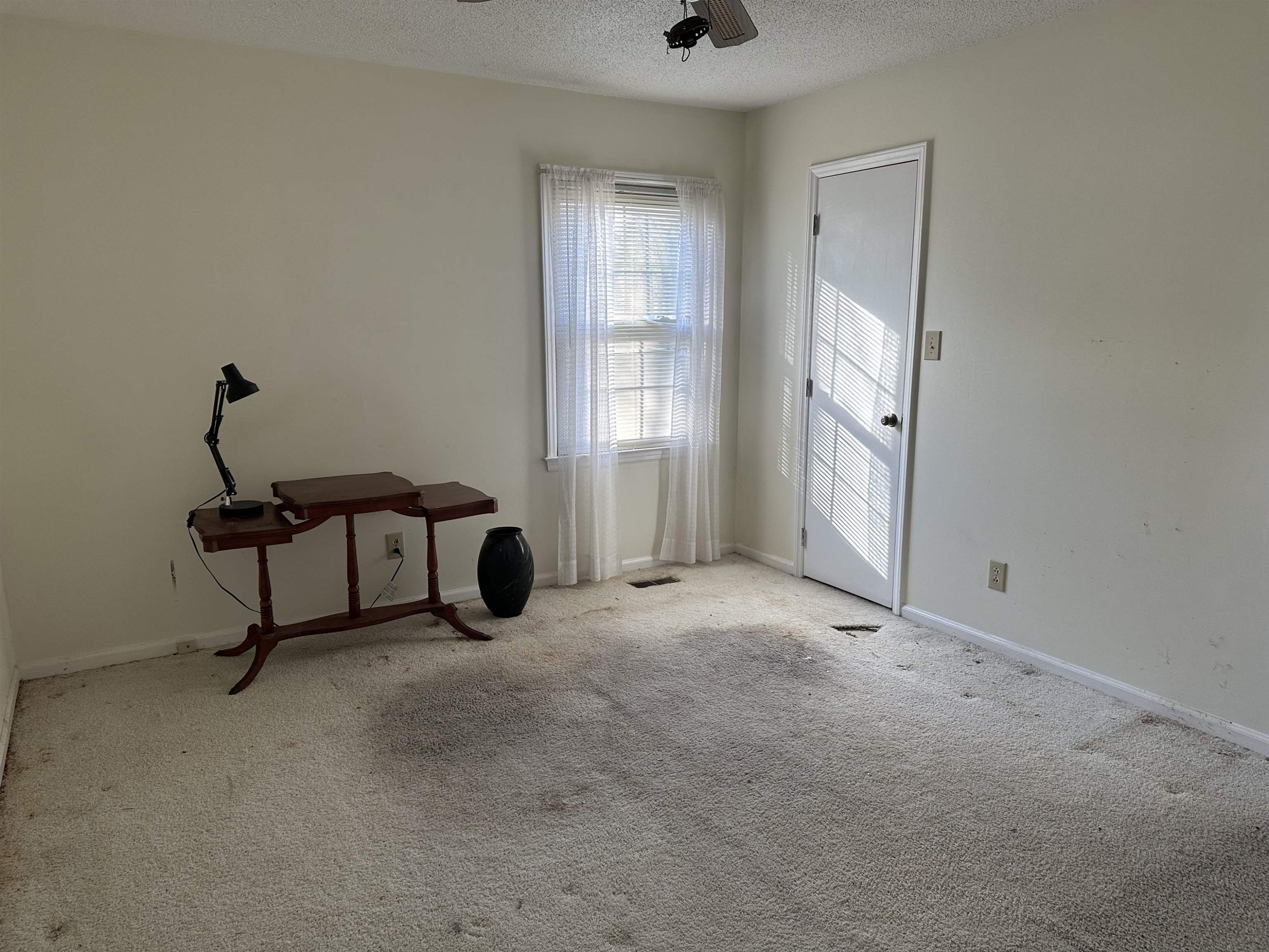 6000 Neuse Street Raleigh, NC 27610 - Photo 11 of 13 a view of a room with window and hardwood floor