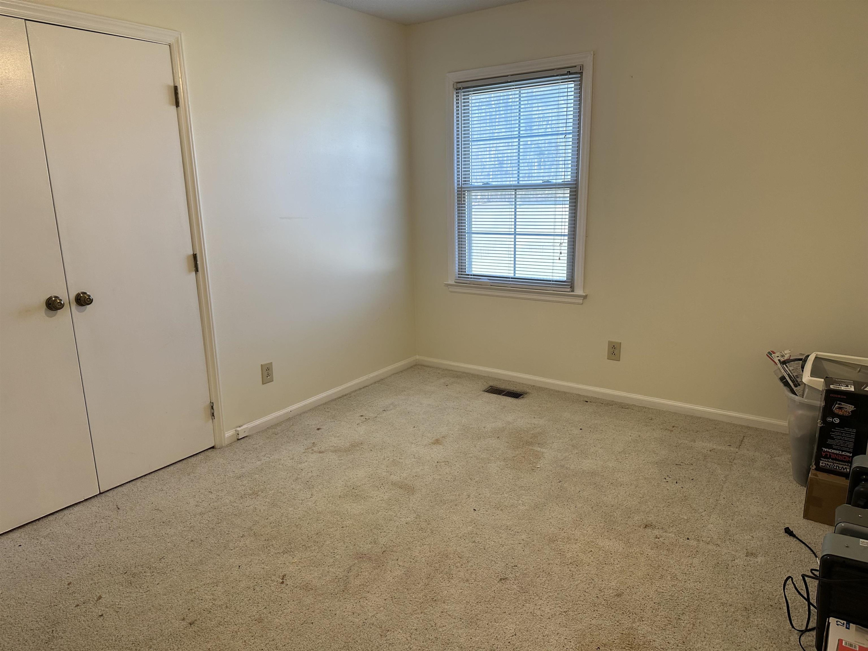 6000 Neuse Street Raleigh, NC 27610 - Photo 10 of 13 an empty room with windows