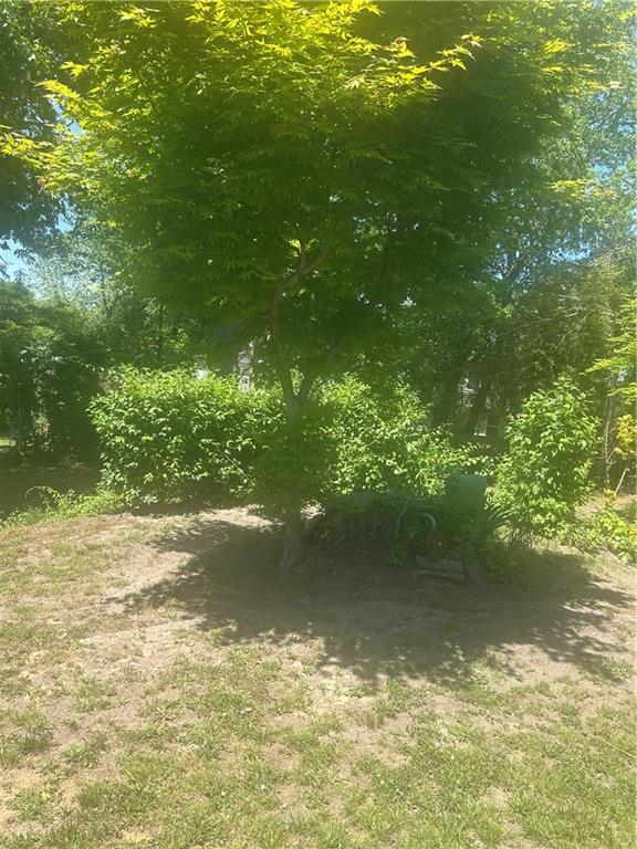 636 Holmdel Road Hazlet, NJ 07730 - Photo 1 of 47 a view of a lake from a yard