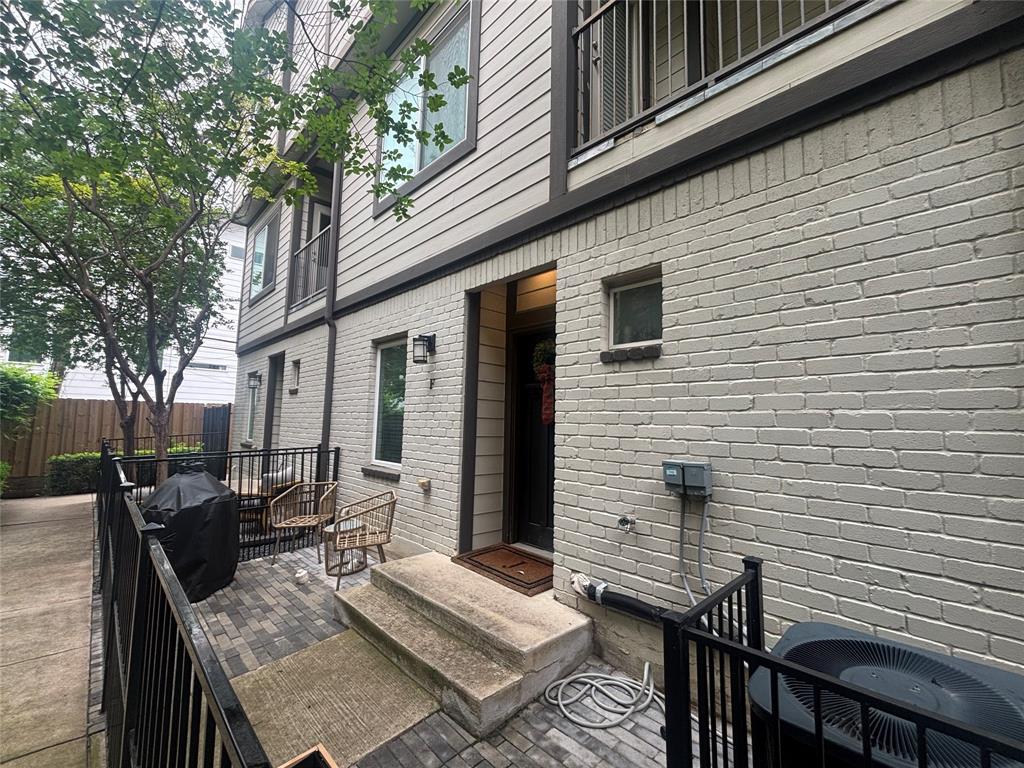 5924 Hudson Street, Unit F Dallas, TX 75206 - Photo 1 of 25 a view of a house with patio