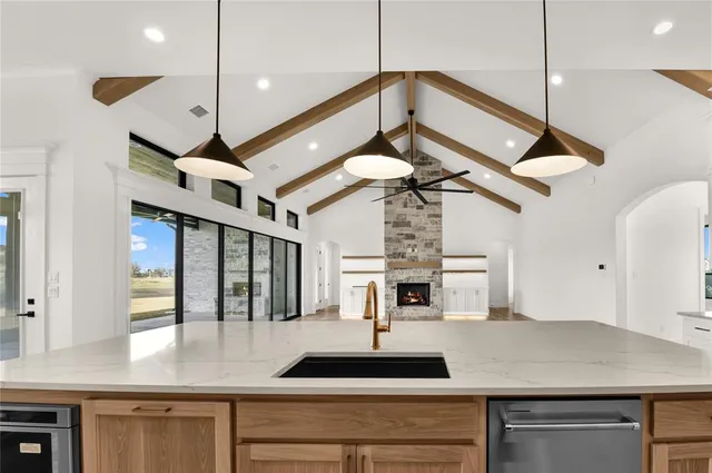 a kitchen with a table and a stove