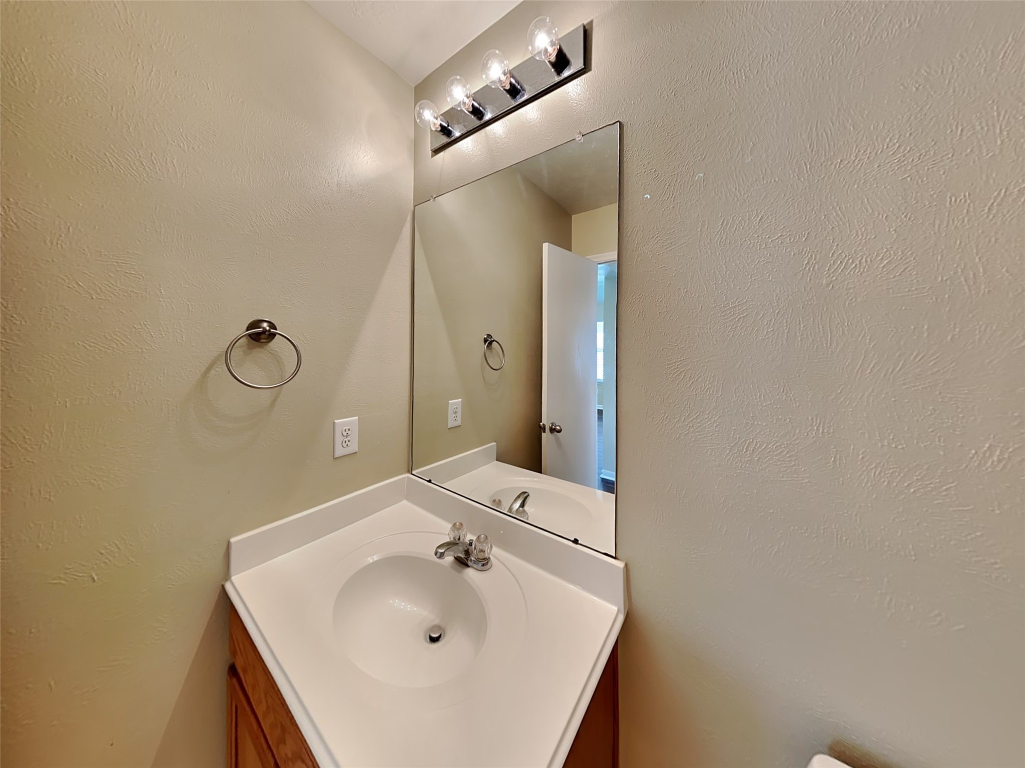 19022 Walbrook Meadows Lane Cypress, TX 77433 - Photo 19 of 23 a bathroom with a sink and mirror