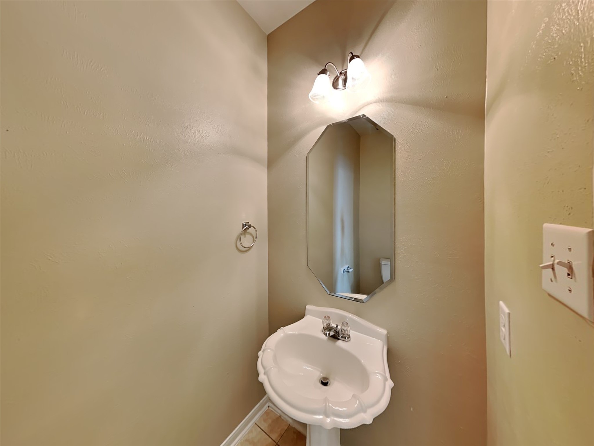 19022 Walbrook Meadows Lane Cypress, TX 77433 - Photo 8 of 23 a bathroom with a sink and a mirror