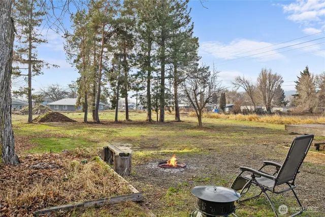 a view of a yard with a slide