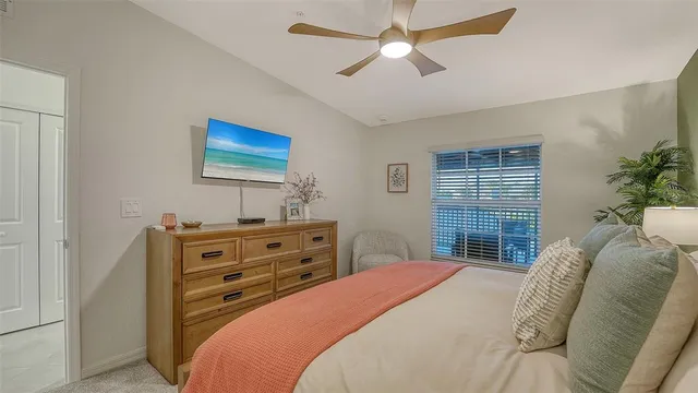 a view of a lake with houses in the back