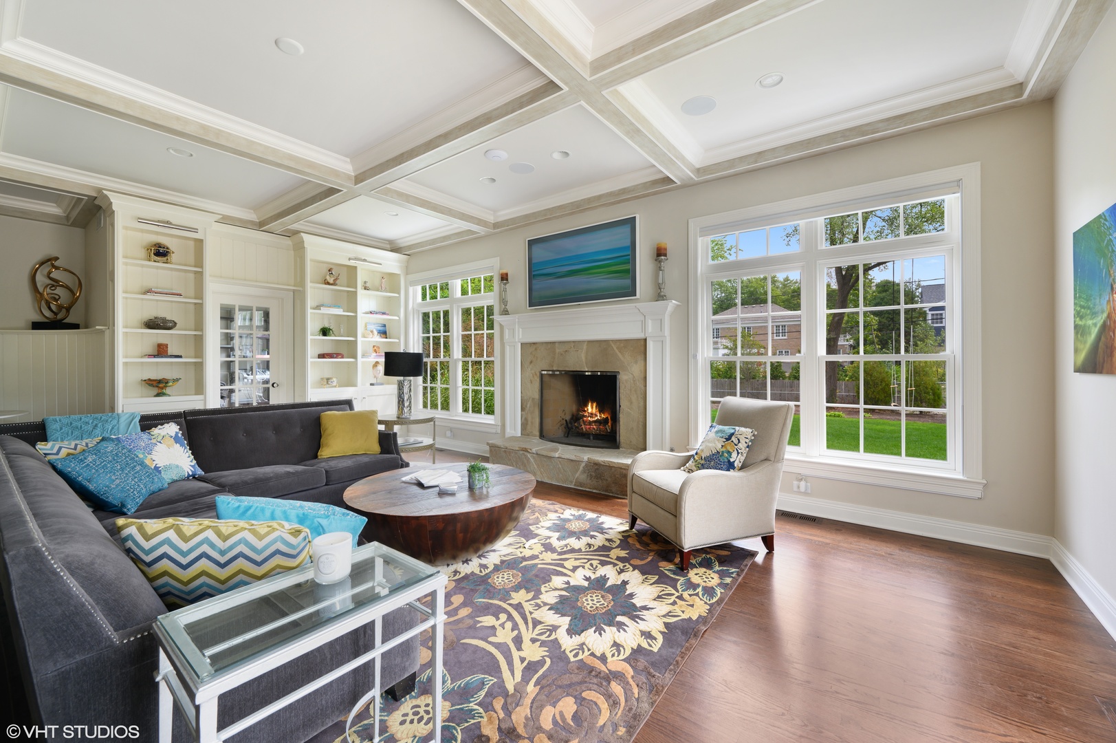 909 Windsor Road Glenview, IL 60025 - Photo 18 of 47 a living room with furniture and a fireplace