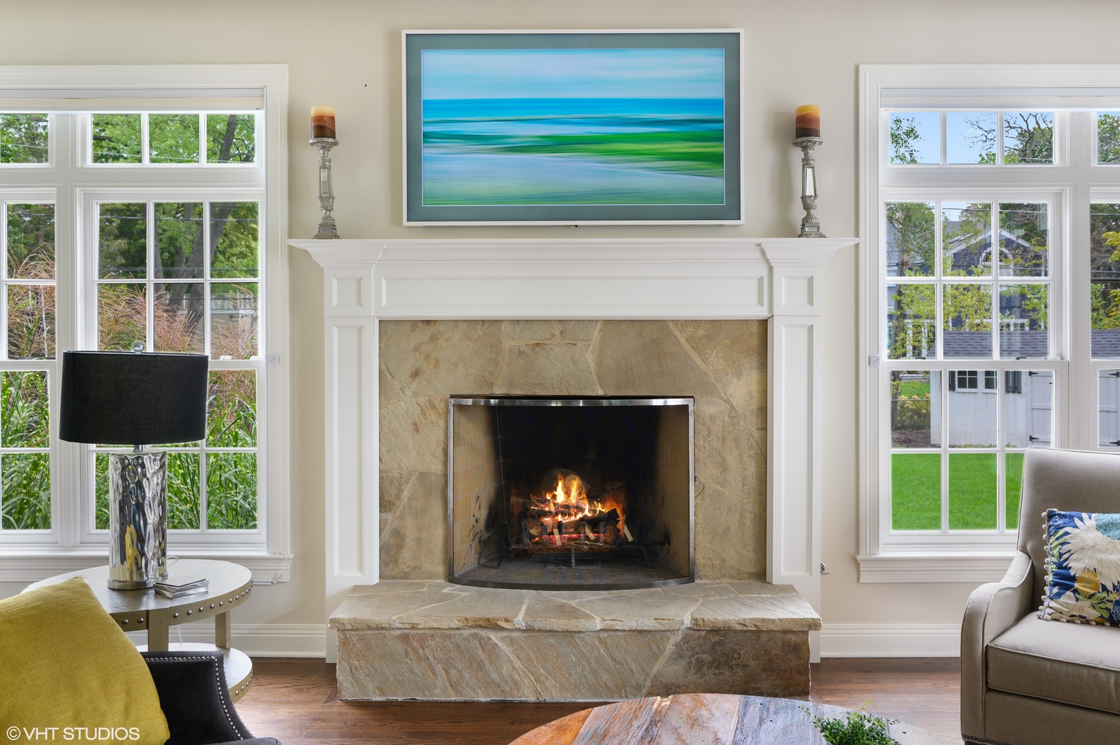 909 Windsor Road Glenview, IL 60025 - Photo 19 of 47 a living room with a fireplace and a fireplace