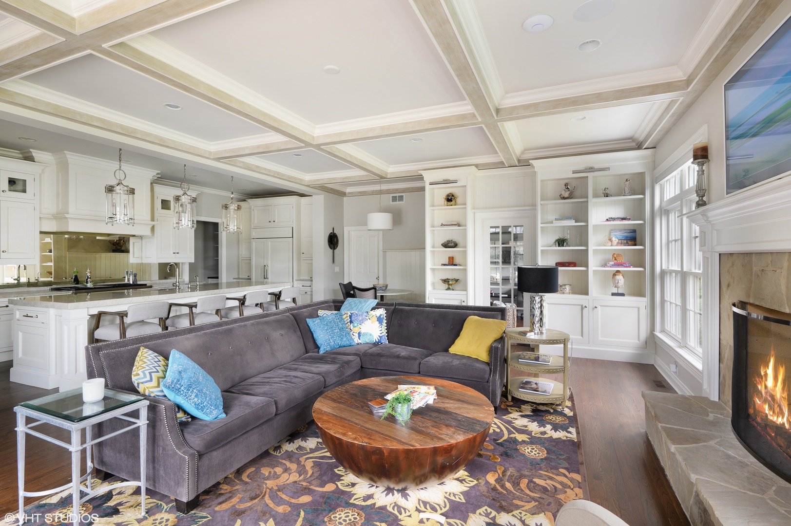 909 Windsor Road Glenview, IL 60025 - Photo 20 of 47 a living room with furniture a rug and a flat screen tv