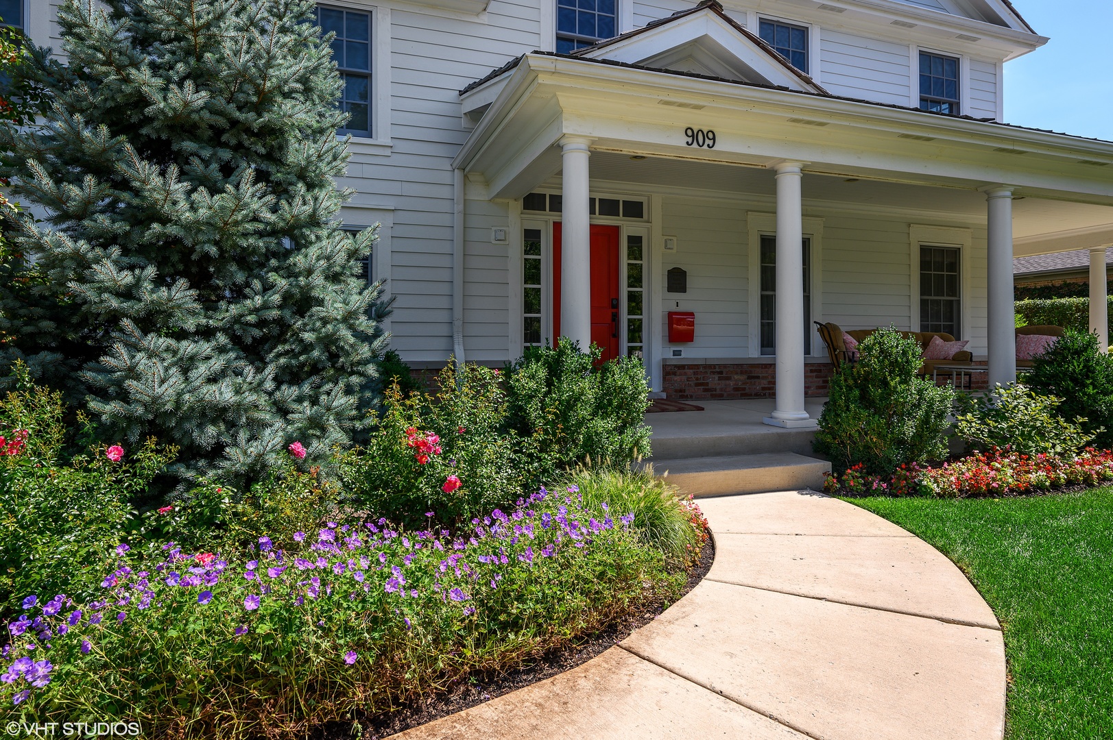 909 Windsor Road Glenview, IL 60025 - Photo 3 of 47 a view of a house with potted plants