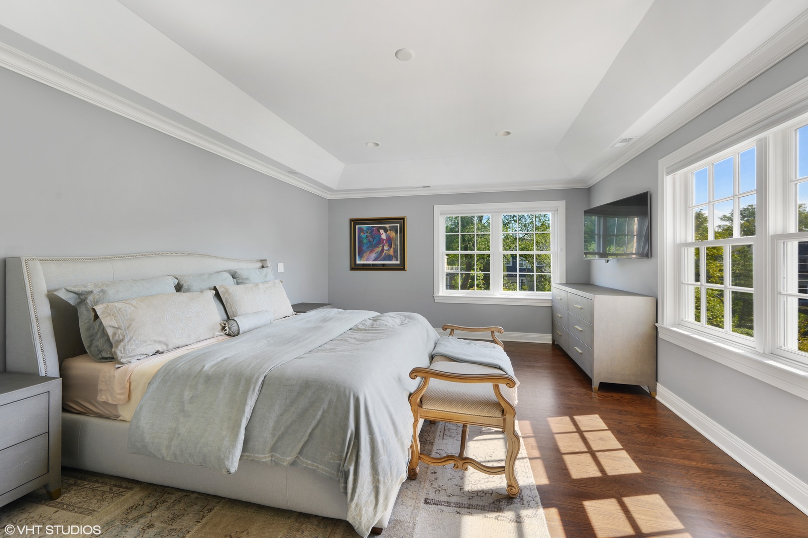 909 Windsor Road Glenview, IL 60025 - Photo 24 of 47 a bedroom with a bed and a large window