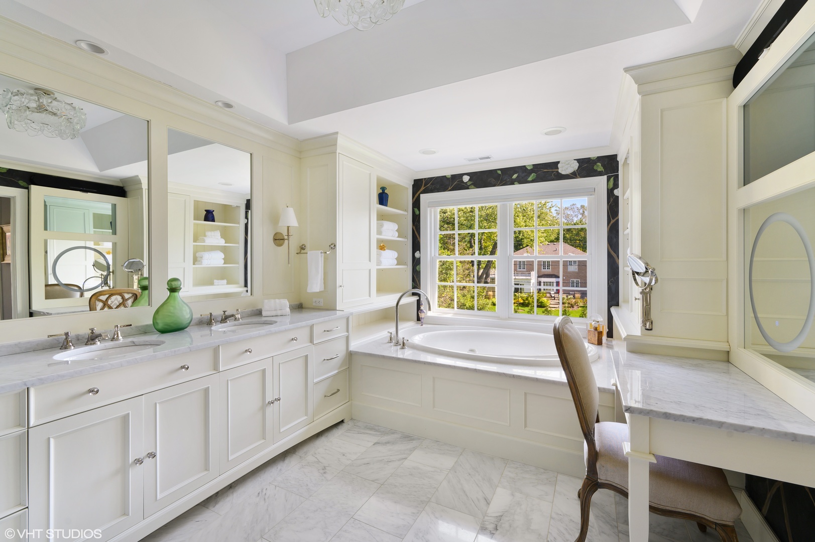 909 Windsor Road Glenview, IL 60025 - Photo 25 of 47 a large white kitchen with sink and dining table