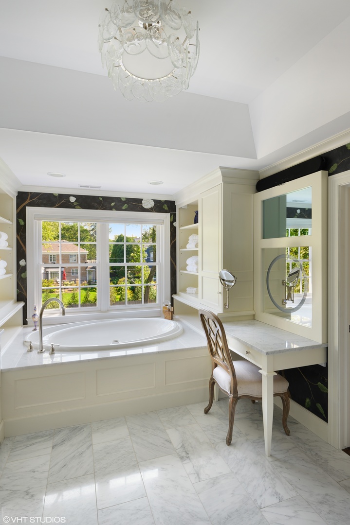 909 Windsor Road Glenview, IL 60025 - Photo 26 of 47 a living room with furniture and a large window