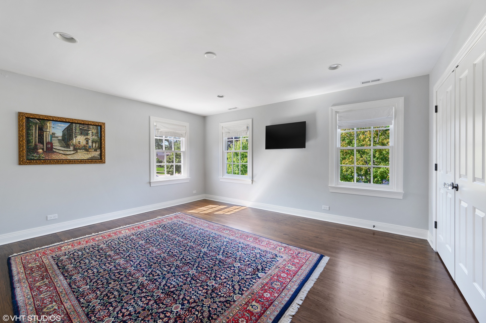 909 Windsor Road Glenview, IL 60025 - Photo 29 of 47 a view of an empty room with a window and wooden floor