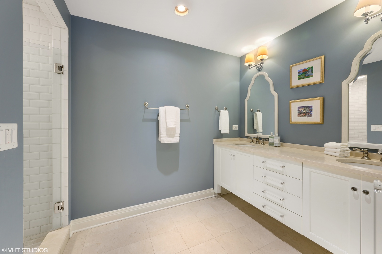 909 Windsor Road Glenview, IL 60025 - Photo 33 of 47 a bathroom with a double vanity sink mirror and