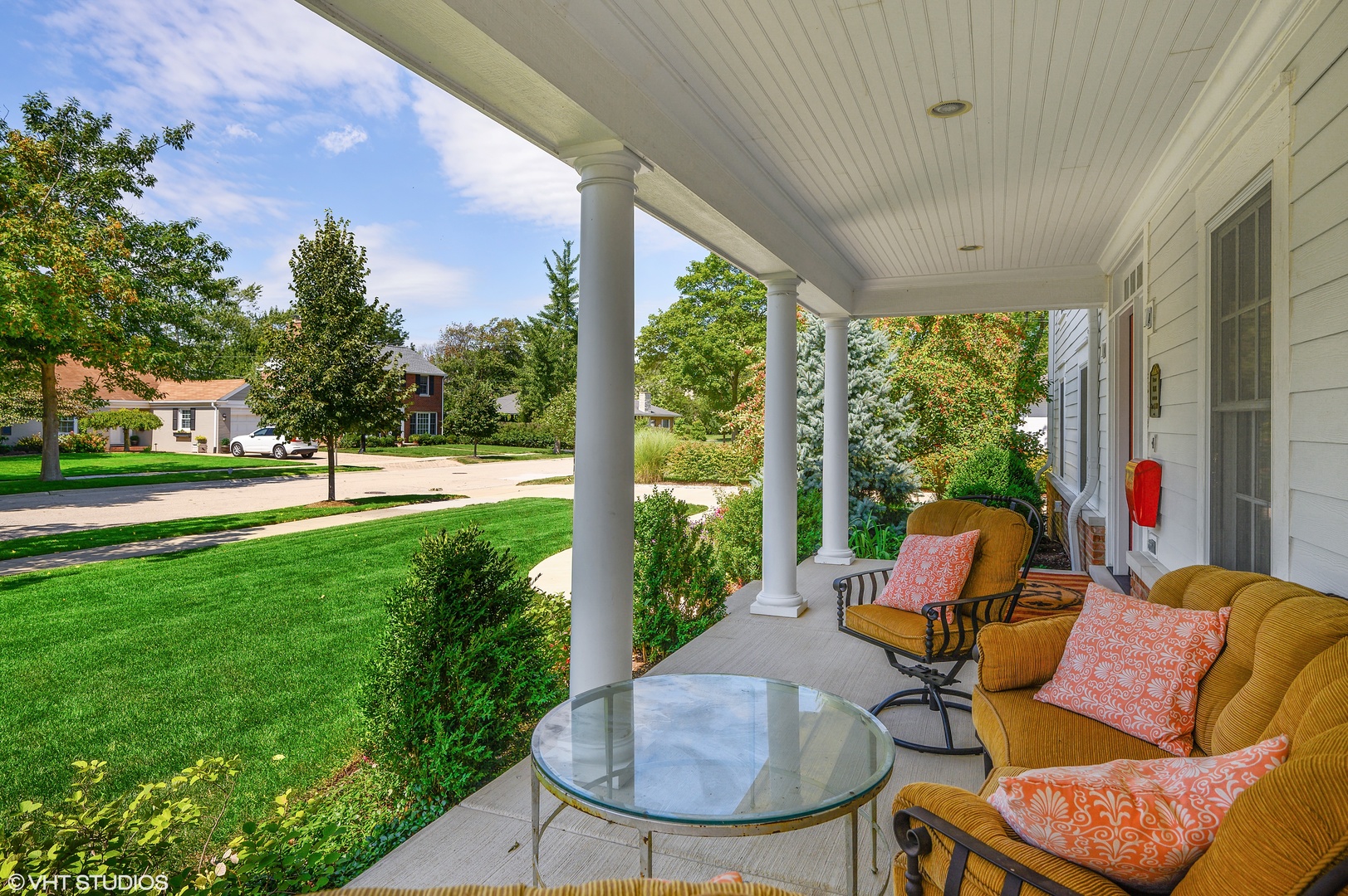 909 Windsor Road Glenview, IL 60025 - Photo 6 of 47 a view of a patio with couches chairs and a table and chairs with the garden view