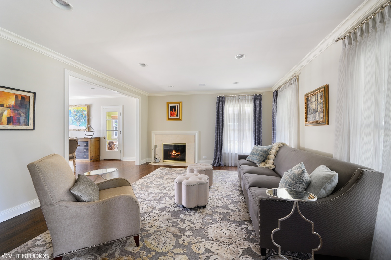 909 Windsor Road Glenview, IL 60025 - Photo 8 of 47 a living room with furniture and a fireplace