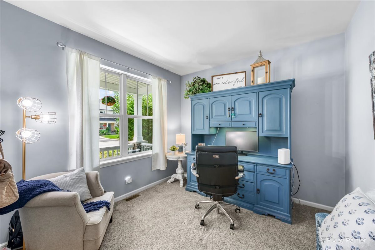 237 Foxford Drive Cary, IL 60013 - Photo 11 of 66 a workspace with furniture and window