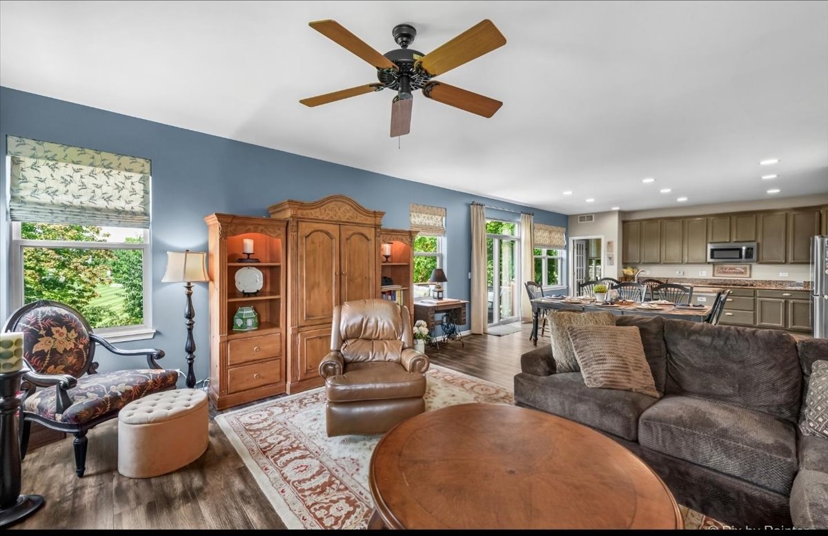 237 Foxford Drive Cary, IL 60013 - Photo 15 of 66 a living room with furniture kitchen view and a large window