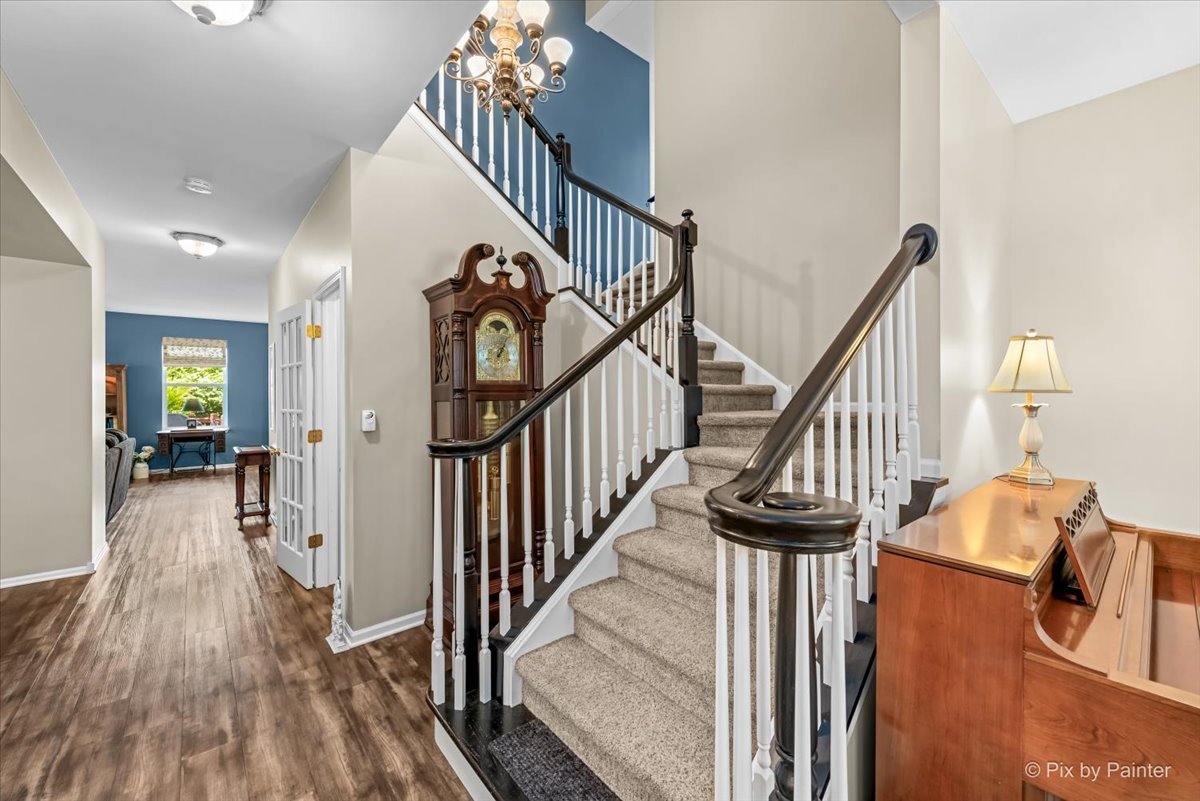 237 Foxford Drive Cary, IL 60013 - Photo 27 of 66 a view of entryway with wooden floor and stairs