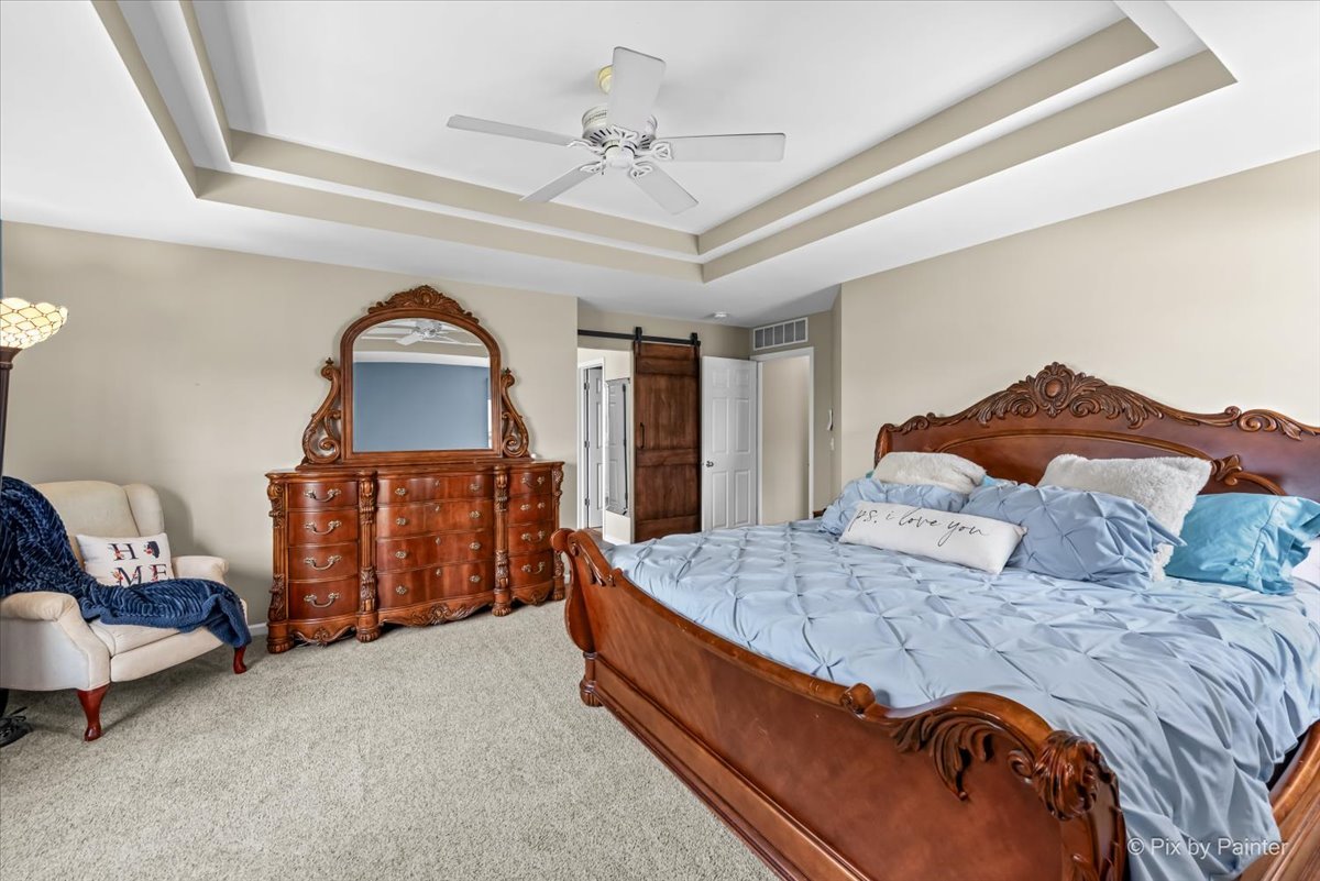 237 Foxford Drive Cary, IL 60013 - Photo 31 of 66 a bedroom with a bed and dresser