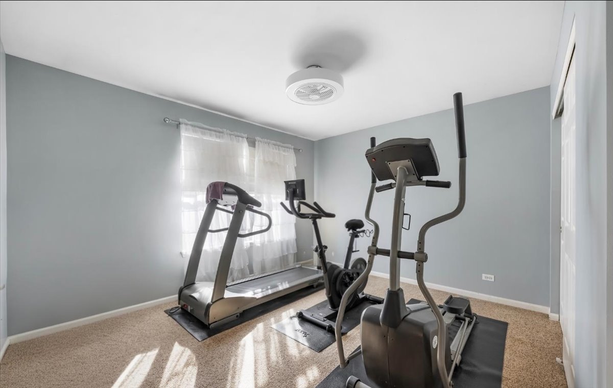 237 Foxford Drive Cary, IL 60013 - Photo 43 of 66 a view of a room with gym equipment