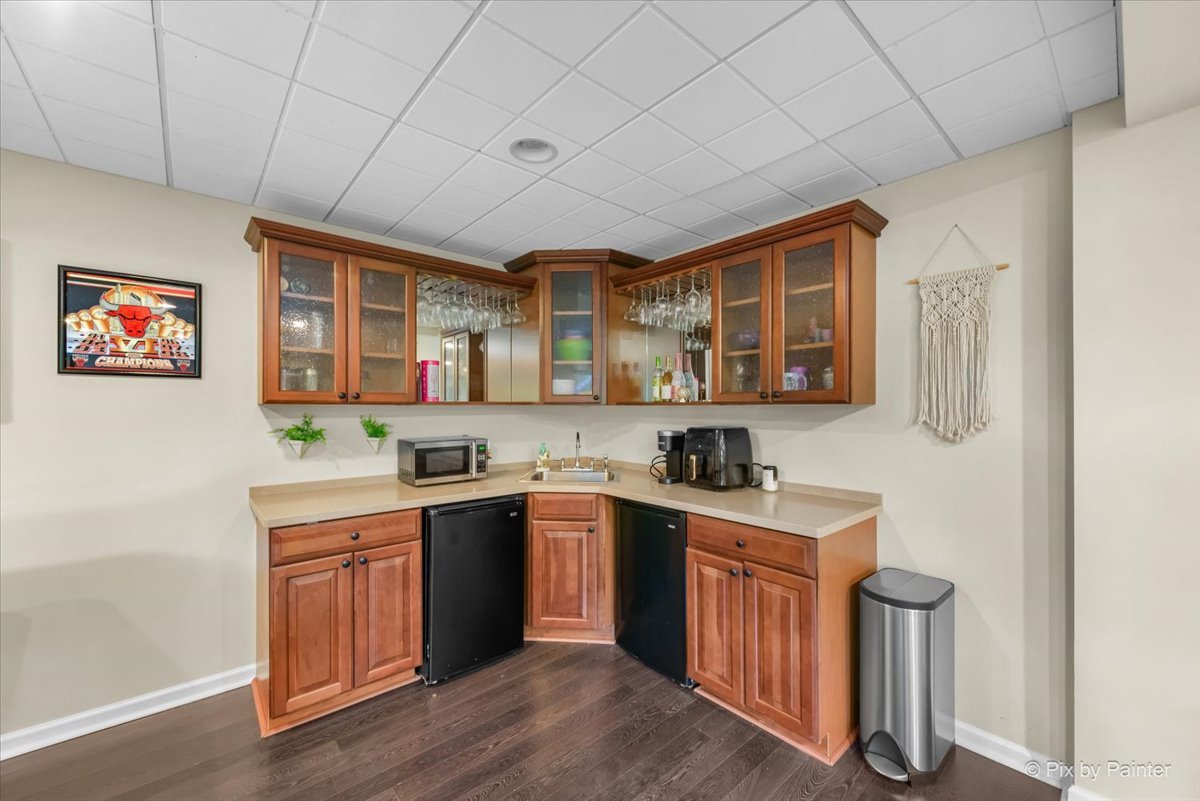 237 Foxford Drive Cary, IL 60013 - Photo 47 of 66 a kitchen with a sink cabinets and wooden floor