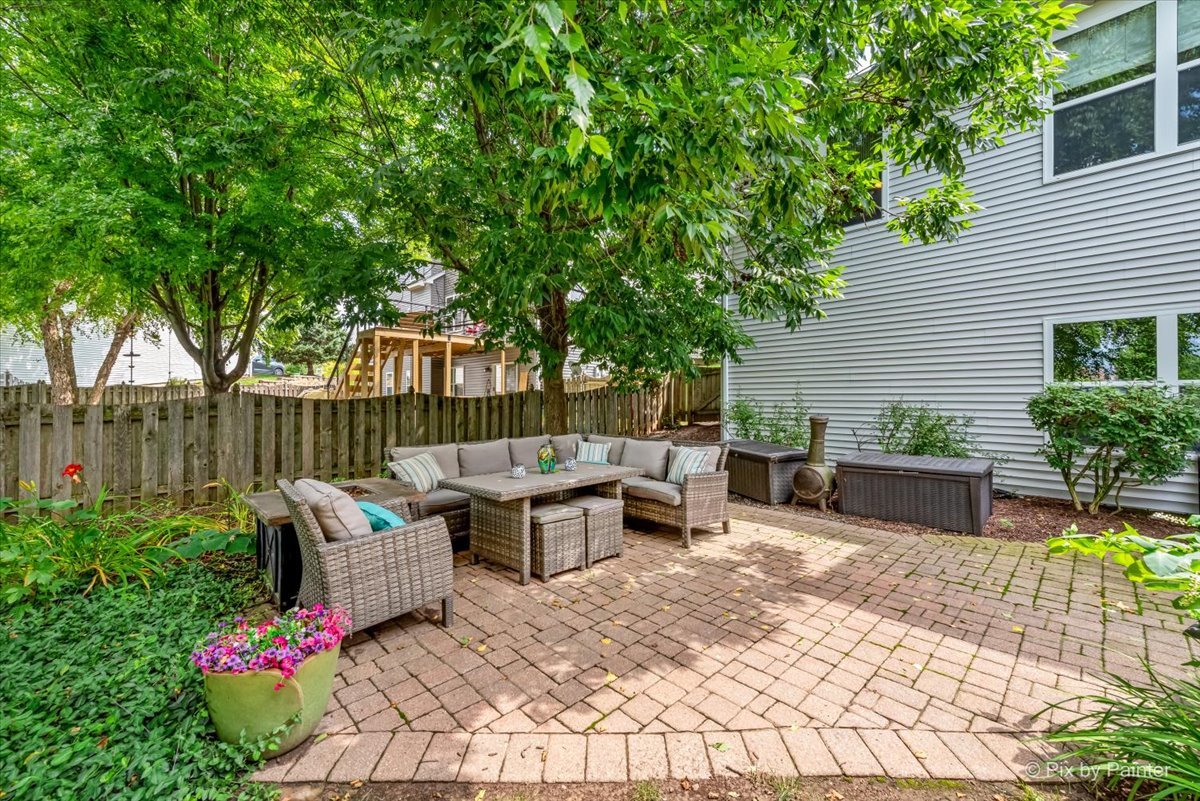 237 Foxford Drive Cary, IL 60013 - Photo 59 of 66 a view of backyard with outdoor seating and plants