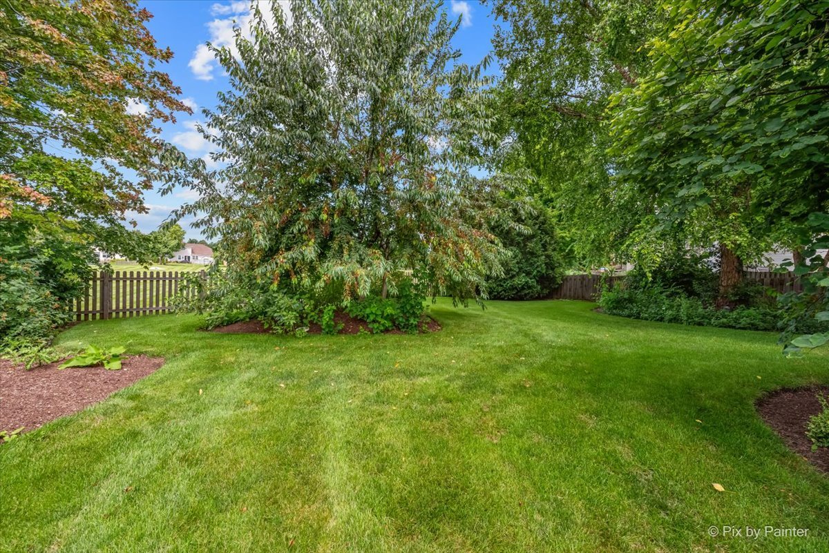 237 Foxford Drive Cary, IL 60013 - Photo 64 of 66 a view of a grassy field with trees
