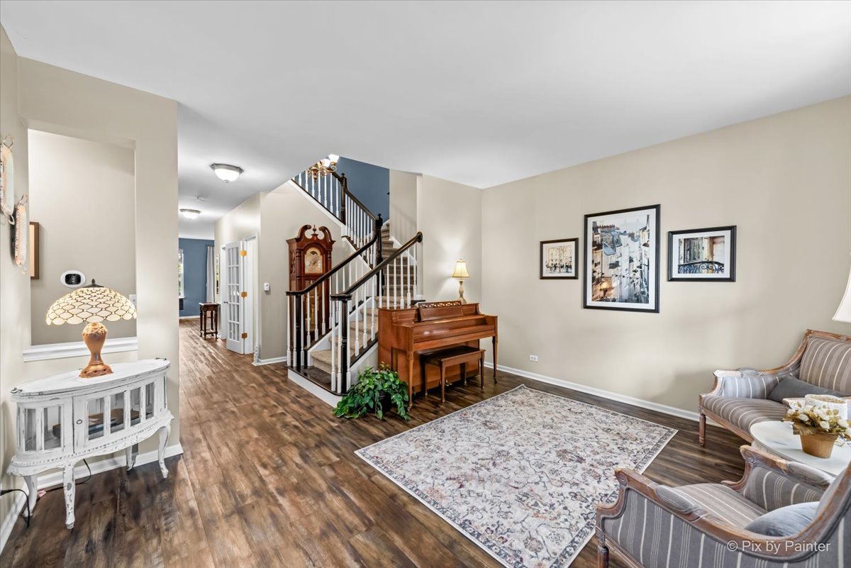 237 Foxford Drive Cary, IL 60013 - Photo 8 of 66 a living room with furniture and wooden floor