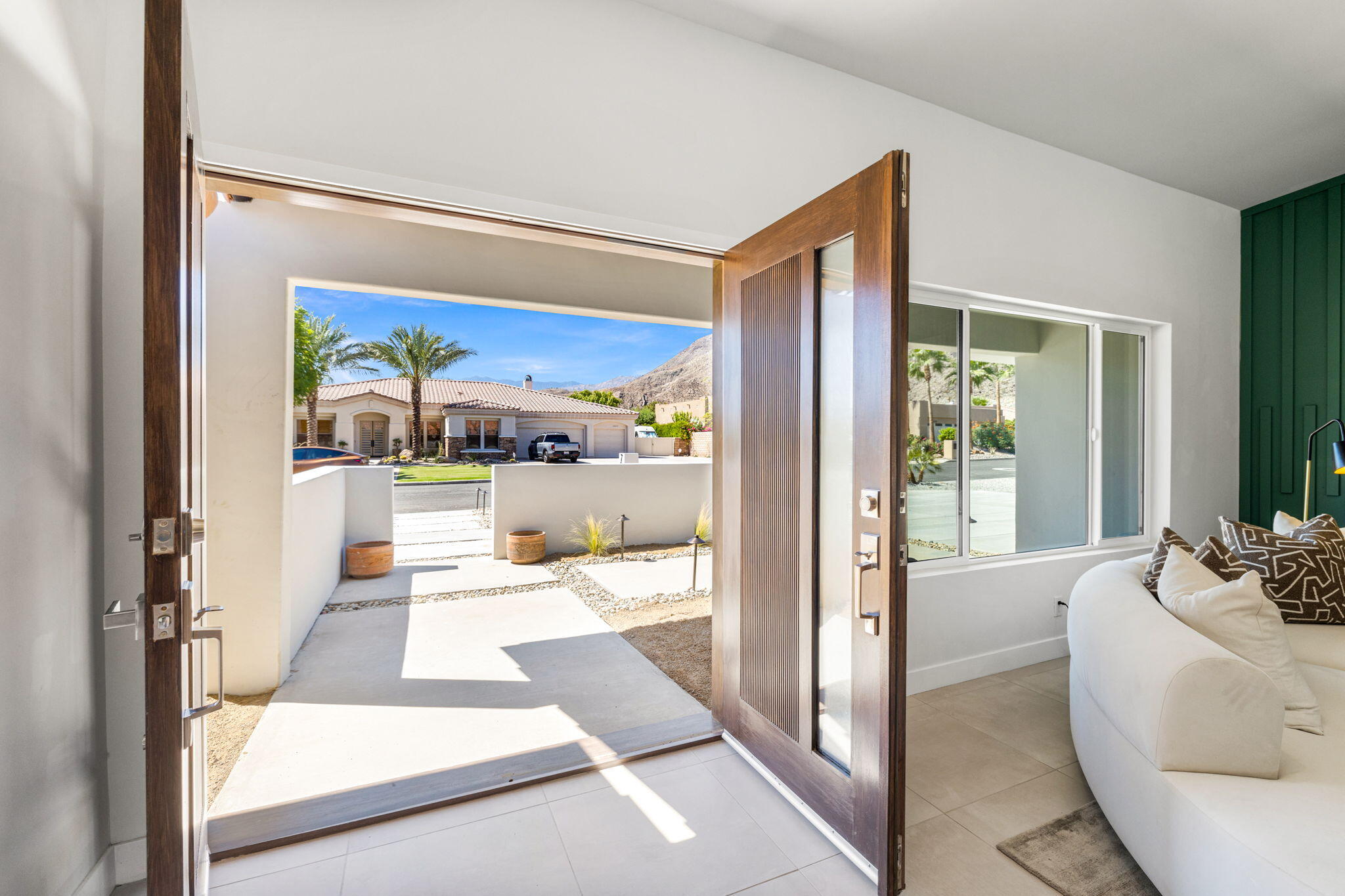 72278 Barbara Drive Rancho Mirage, CA 92270 - Photo 16 of 69 a living room with furniture and a large window