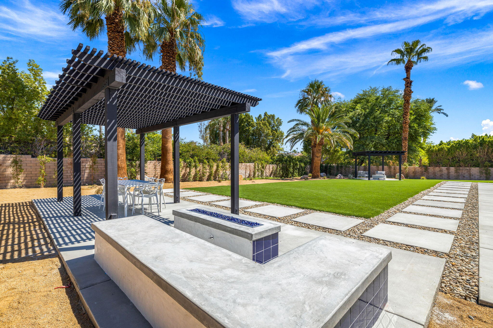 72278 Barbara Drive Rancho Mirage, CA 92270 - Photo 20 of 69 a view of a backyard with a patio