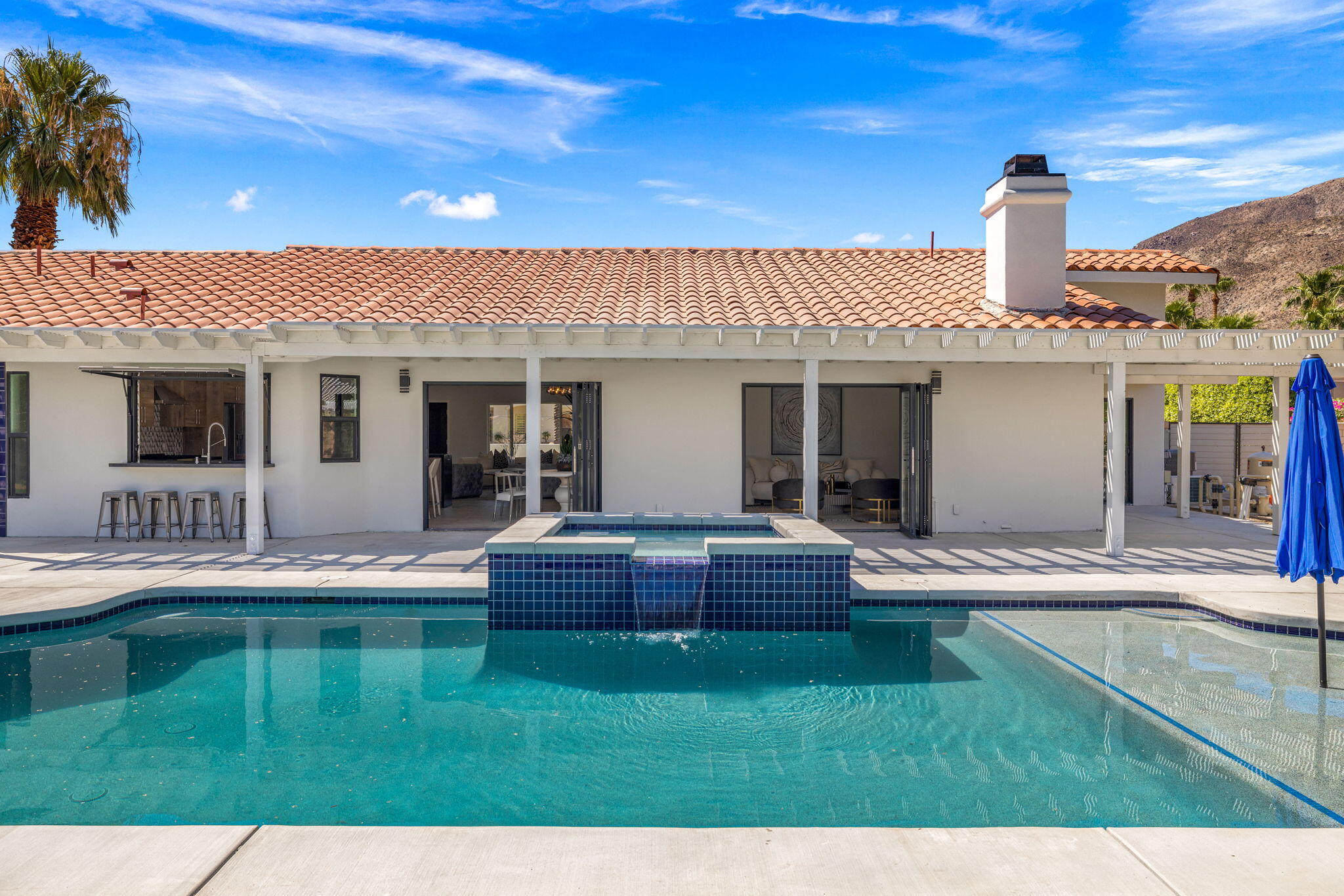 72278 Barbara Drive Rancho Mirage, CA 92270 - Photo 24 of 69 a view of a house with a backyard porch and sitting area
