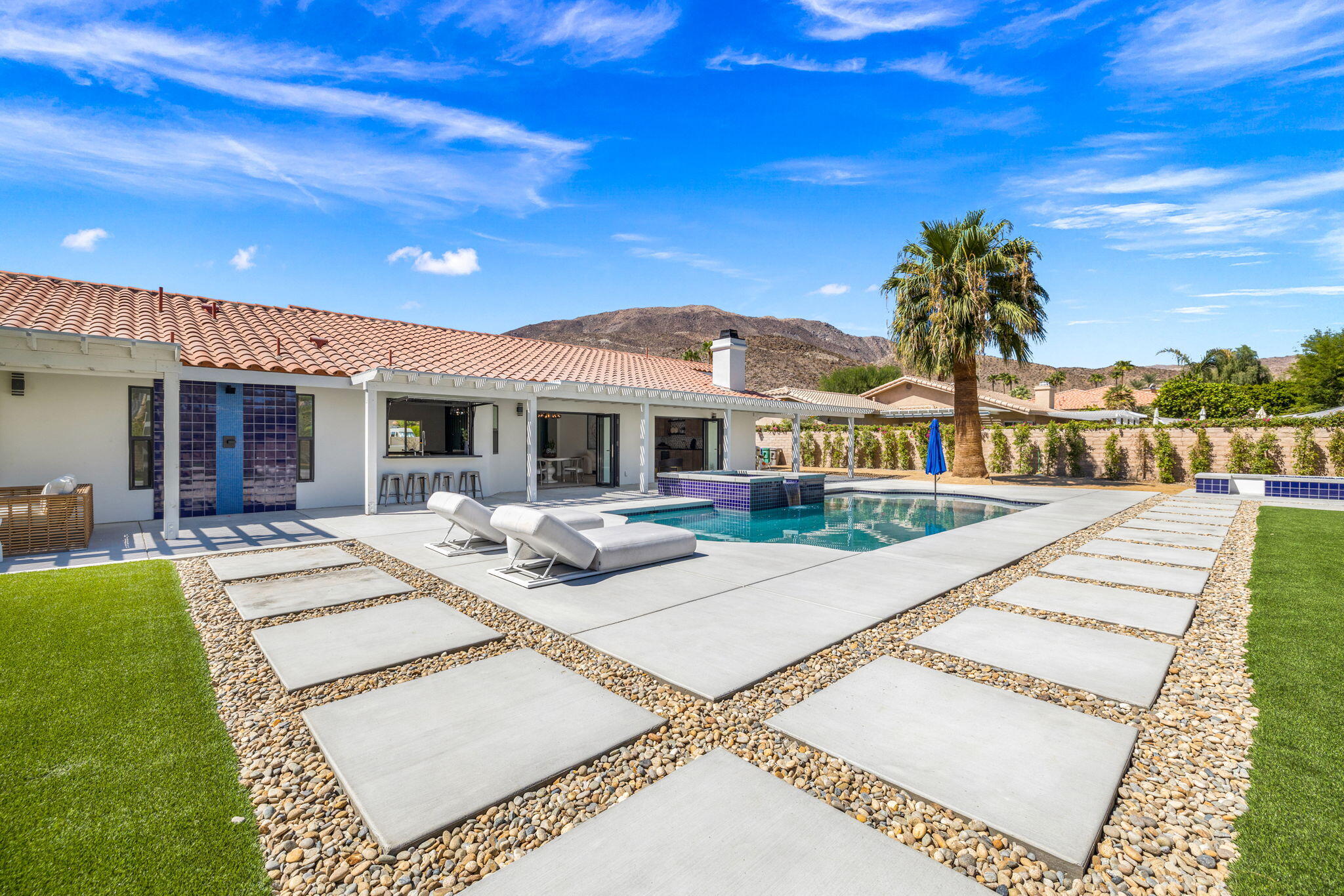 72278 Barbara Drive Rancho Mirage, CA 92270 - Photo 29 of 69 a view of a house with backyard porch and sitting area