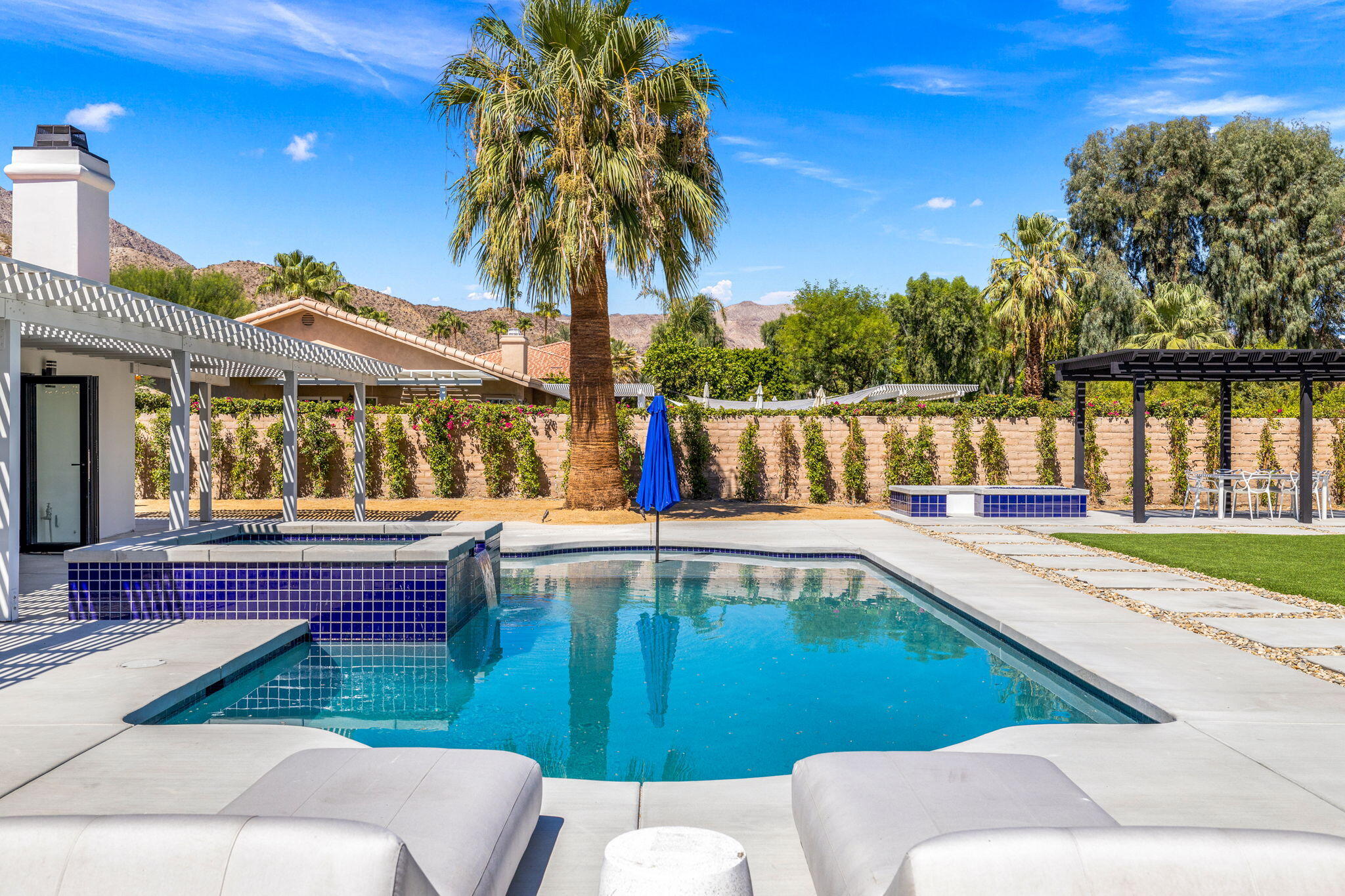 72278 Barbara Drive Rancho Mirage, CA 92270 - Photo 30 of 69 a view of a swimming pool with a patio